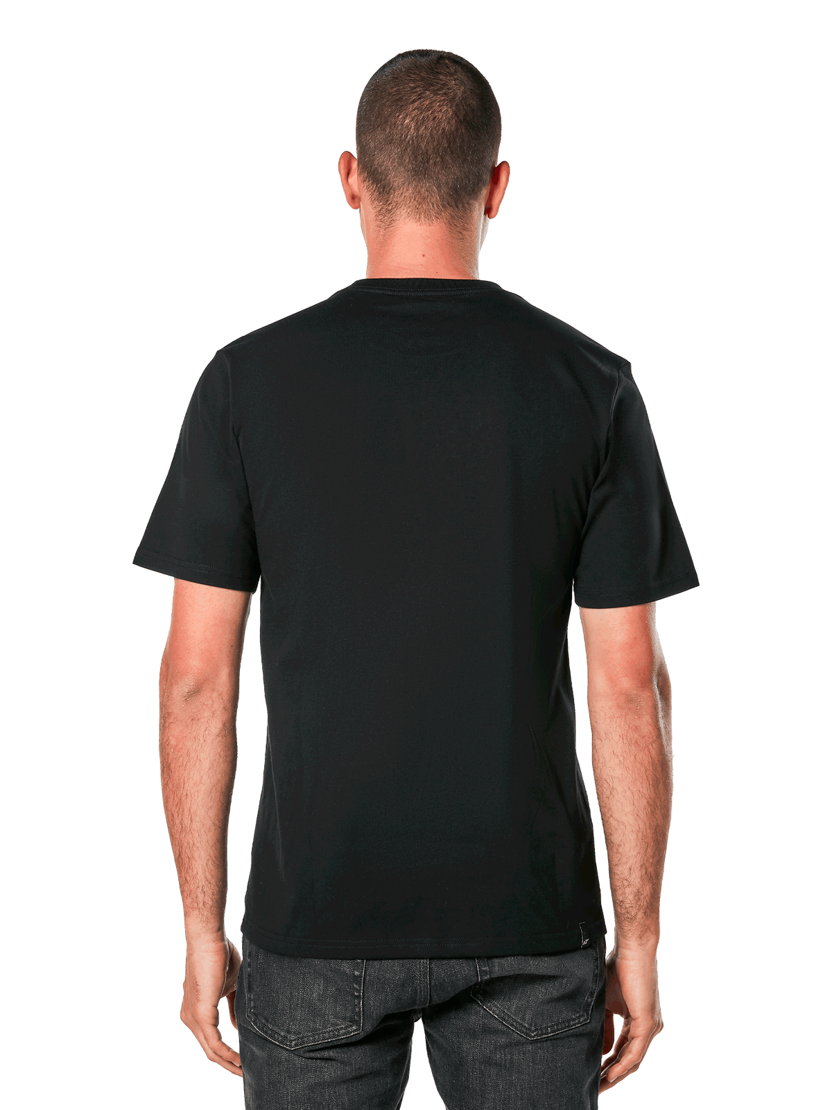 T-shirt Alpinestars Ride 4.0 CSF, vue de dos, t-shirt noir à manches courtes, vêtement de sport décontracté d'inspiration sport automobile, porté par un homme avec un jean foncé