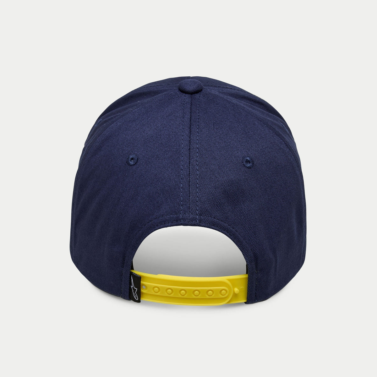 Casquette Alpinestars Par, casquette snapback bleu marine, vue arrière avec attache ajustable jaune vif et petite étiquette logo noire, couronne structurée en twill de coton bleu marine, couvre-chef sportswear décontracté