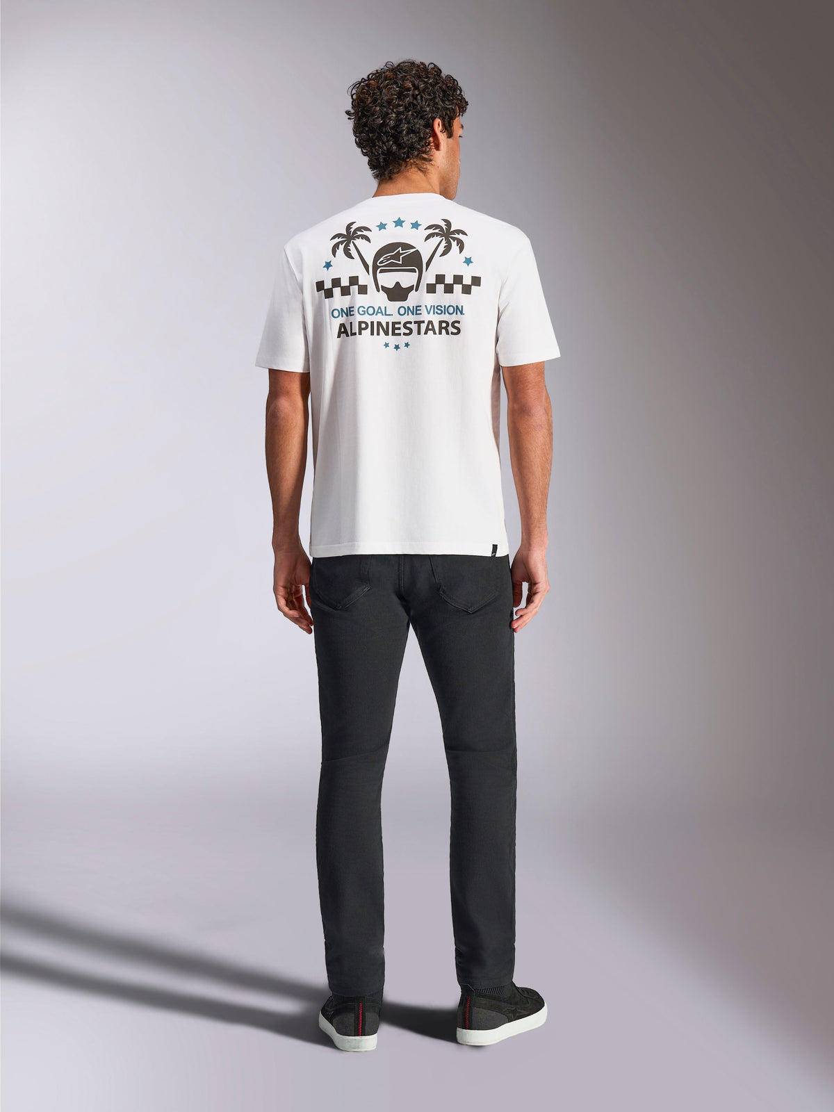 Alpinestars Order CSF Tee, Short Sleeve T-Shirt, White, Back view featuring helmet and palm trees graphic, checkered pattern, and Alpinestars branding, Casual Motorsport Sportswear