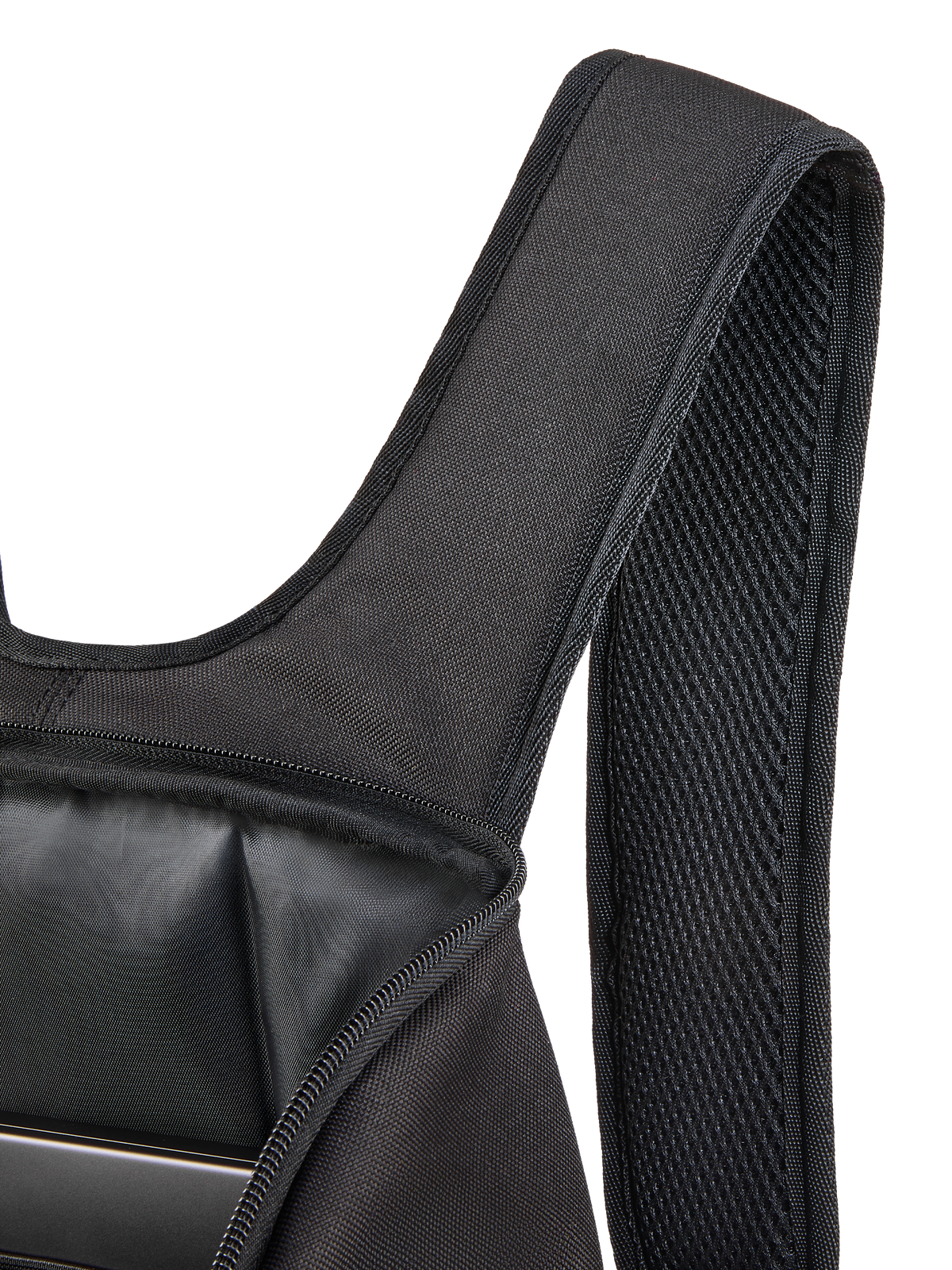 Alpinestars Defcon V3 Backpack, close-up of the padded air mesh shoulder strap and open main compartment, black 600D polyester, showing internal laptop sleeve and durable textile construction.