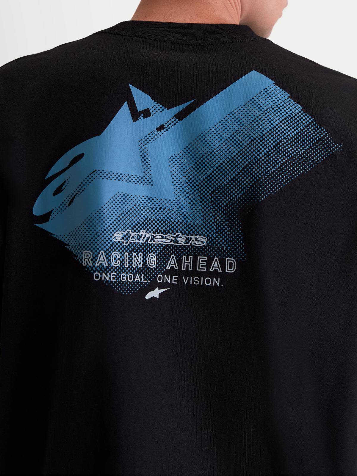 Alpinestars T-Shirt Ghost Oversized CSF, t-shirt de sportswear à manches courtes, noir et bleu, vue de dos avec grand graphique Astars dégradé et texte Racing Ahead, style décontracté, mélange coton et polyester.