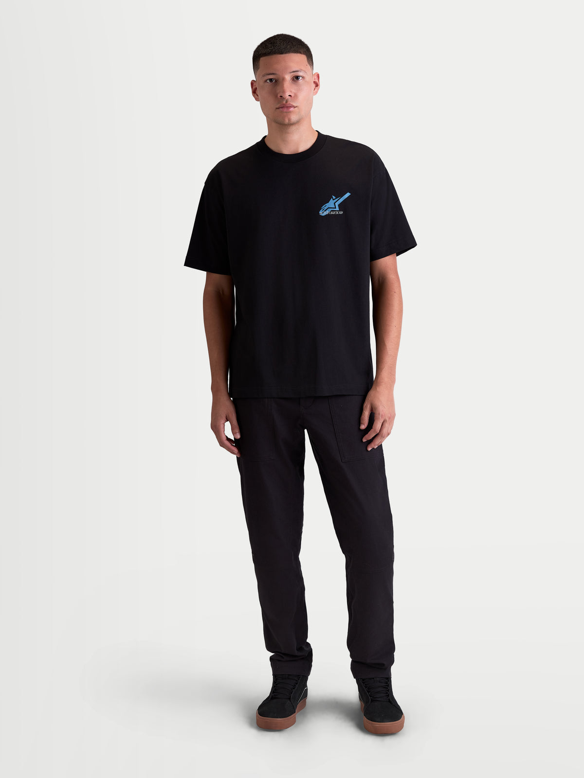 Alpinestars T-Shirt Ghost Oversized CSF, t-shirt sportswear pour homme, noir avec graphique logo bleu sur la poitrine, manches courtes et coupe oversized, vêtement décontracté inspiré du motorsport