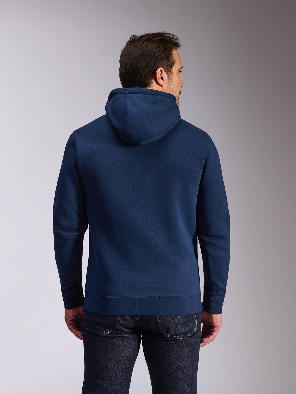Sweat à capuche Alpinestars Ride V3, polaire à enfiler bleu marine, vue de dos montrant un design bleu uni avec capuche doublée de jersey, poignets et ourlet en bords-côtes, vêtement streetwear décontracté