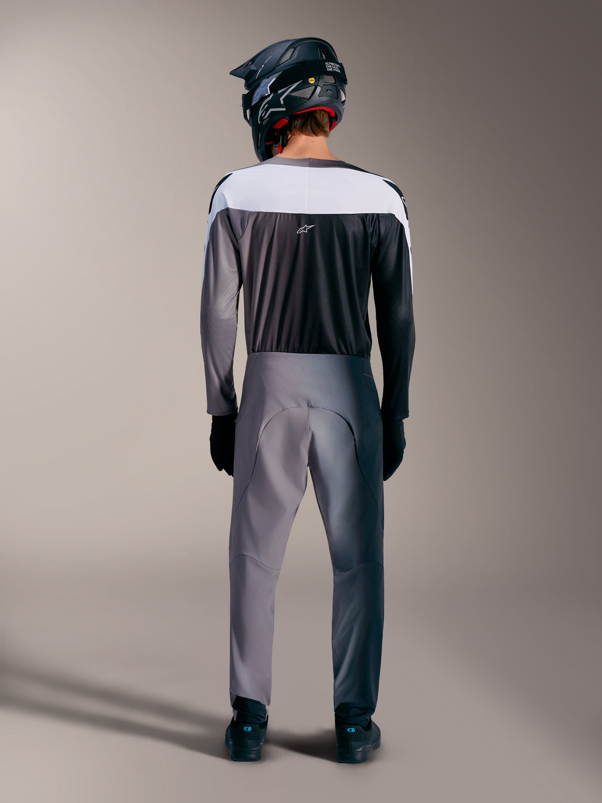 A-Supra Elite Jersey in Faded Gray, rear view of high-performance MTB racing gear with ventilated mesh panels.