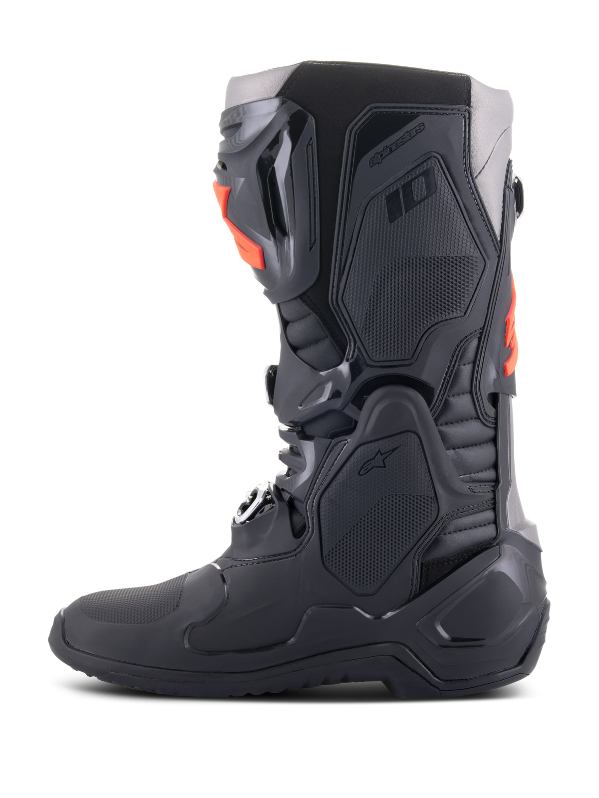 Bottes Alpinestars Tech 10, bottes de motocross, noir et rouge fluo, vue de profil, dotées d'un châssis multi-composants avec plaques de protection en TPU, boucles en aluminium et design profilé pour la course tout-terrain