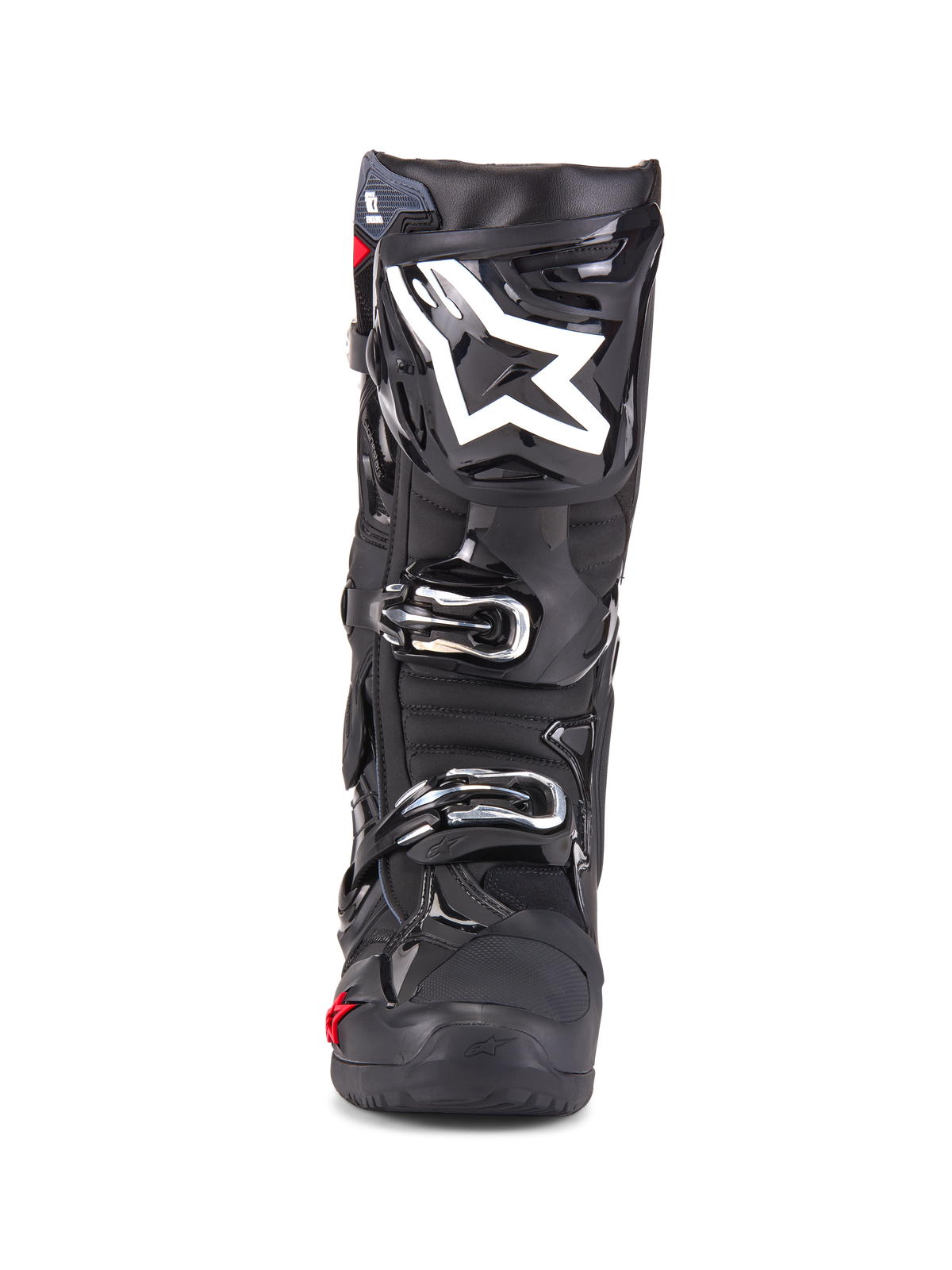 Bottes Alpinestars Tech 10 Enduro, bottes de motocross, noires, vue de face montrant le logo étoile blanc sur le tibia, boucles argentées, finition noire élégante avec panneaux de protection robustes, chaussures haute performance pour la conduite tout-terrain