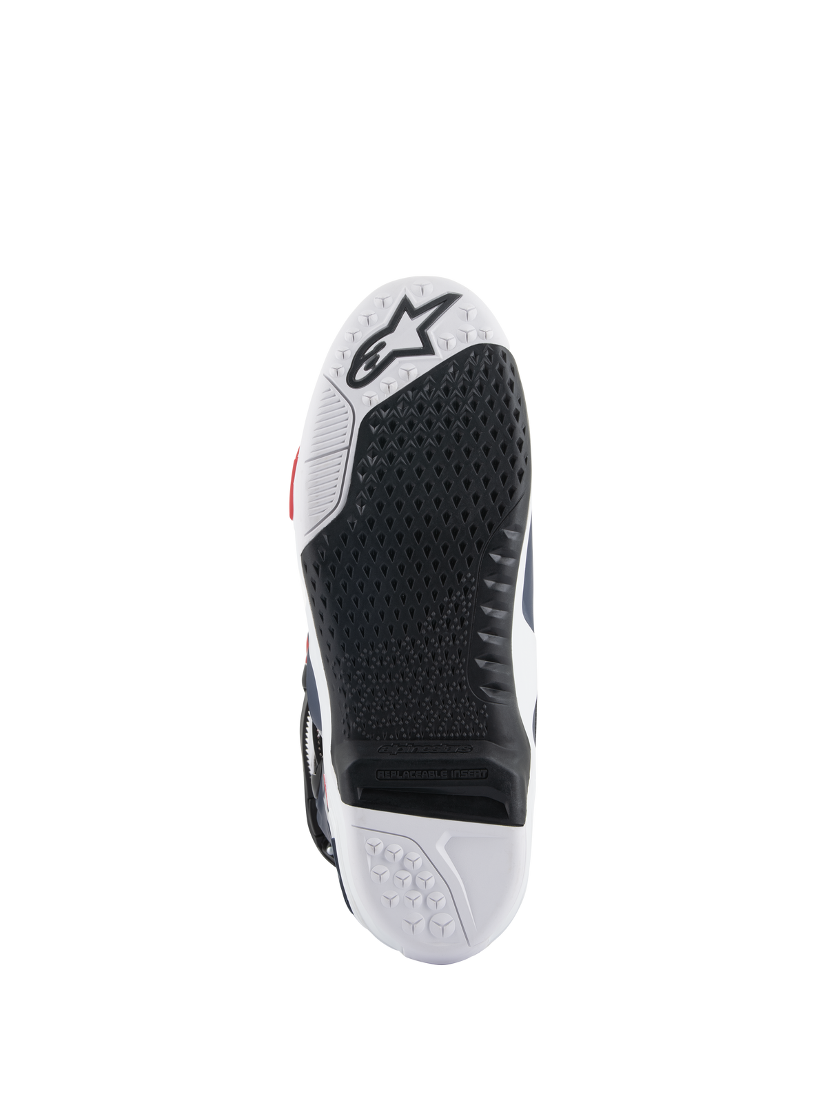 Alpinestars Tech 10 Supervented Boots, semelle, vue de dessous avec conception bi-composant noir et blanc, texture adhérente en nid d'abeille, insert central remplaçable et logo Alpinestars embossé, optimisée pour la performance sur les repose-pieds de motocross.