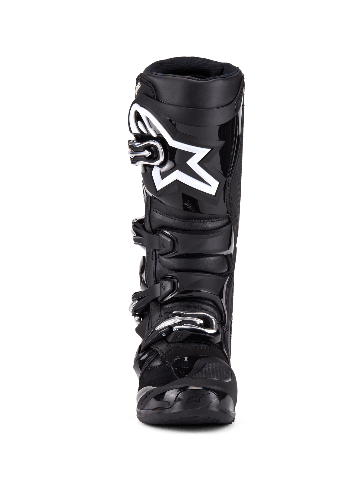 Bottes Alpinestars Tech 7, bottes de motocross, noir, vue de face présentant un système de fermeture à quatre boucles, logo étoile Alpinestars blanc proéminent sur la plaque tibiale, coque en TPU durable et protection renforcée pour la course tout-terrain.