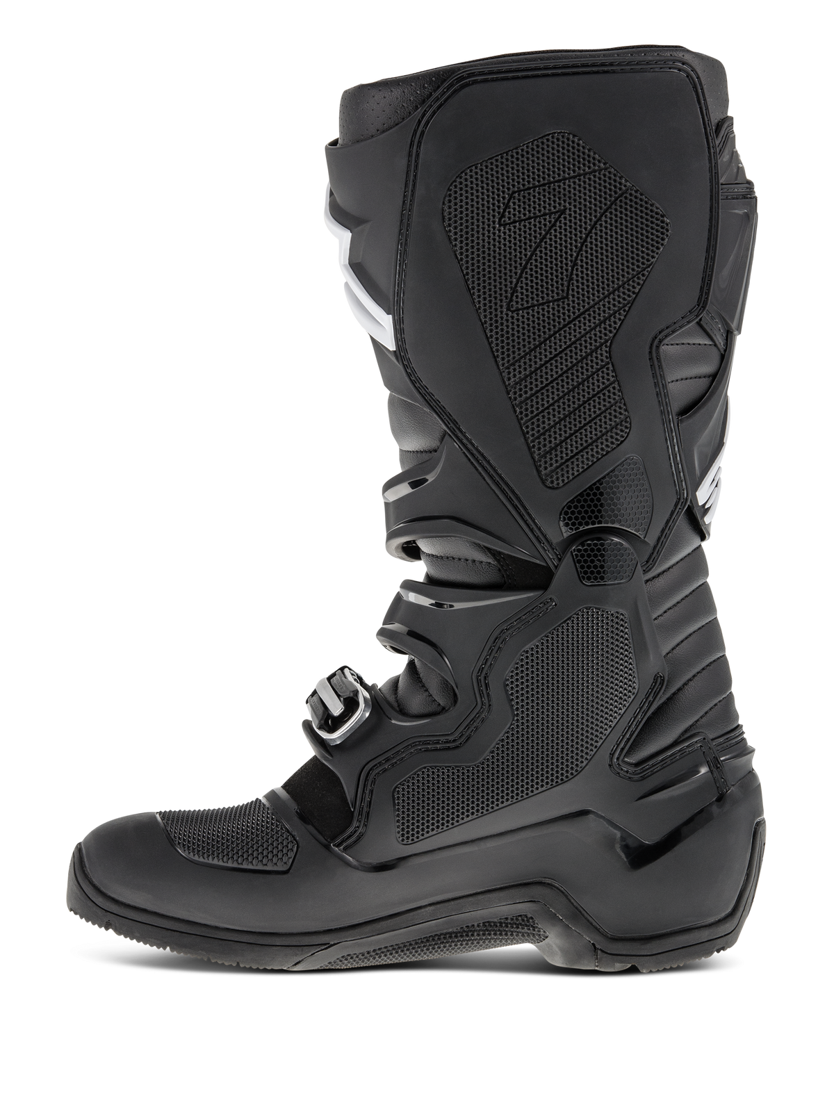 Bottes Alpinestars Tech 7 Enduro, Noir, vue de profil mettant en évidence la face médiale avec insert en caoutchouc alvéolé, panneaux de protection en TPU et système de fermeture à boucles pour la performance motocross tout-terrain