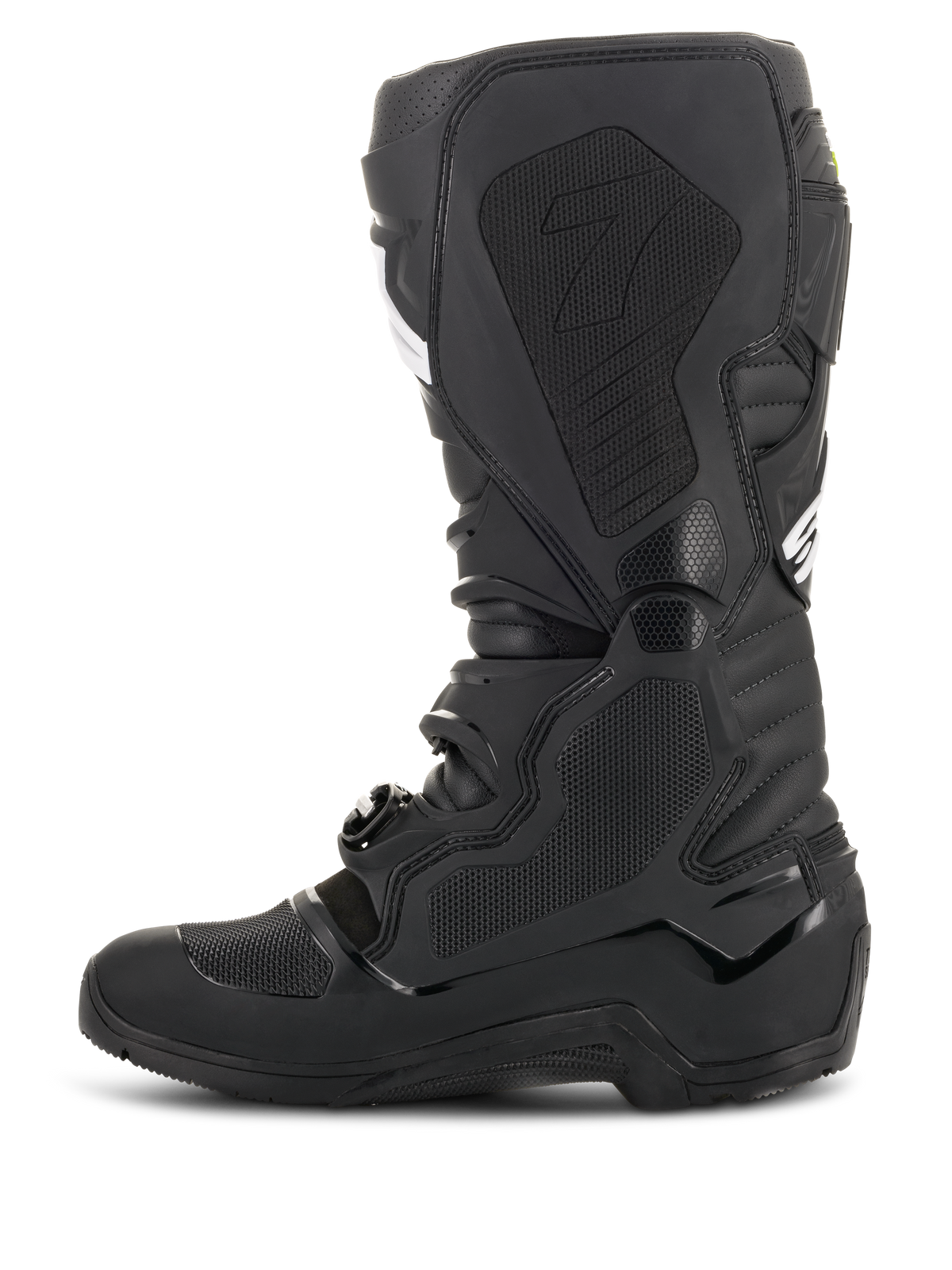 Bottes Alpinestars Tech 7 Enduro Drystar®, noires, vue de profil montrant la zone médiale avec panneaux d'adhérence texturés en nid d'abeille et logo « 7 », chaussures de moto tout-terrain imperméables pour la course d'enduro.