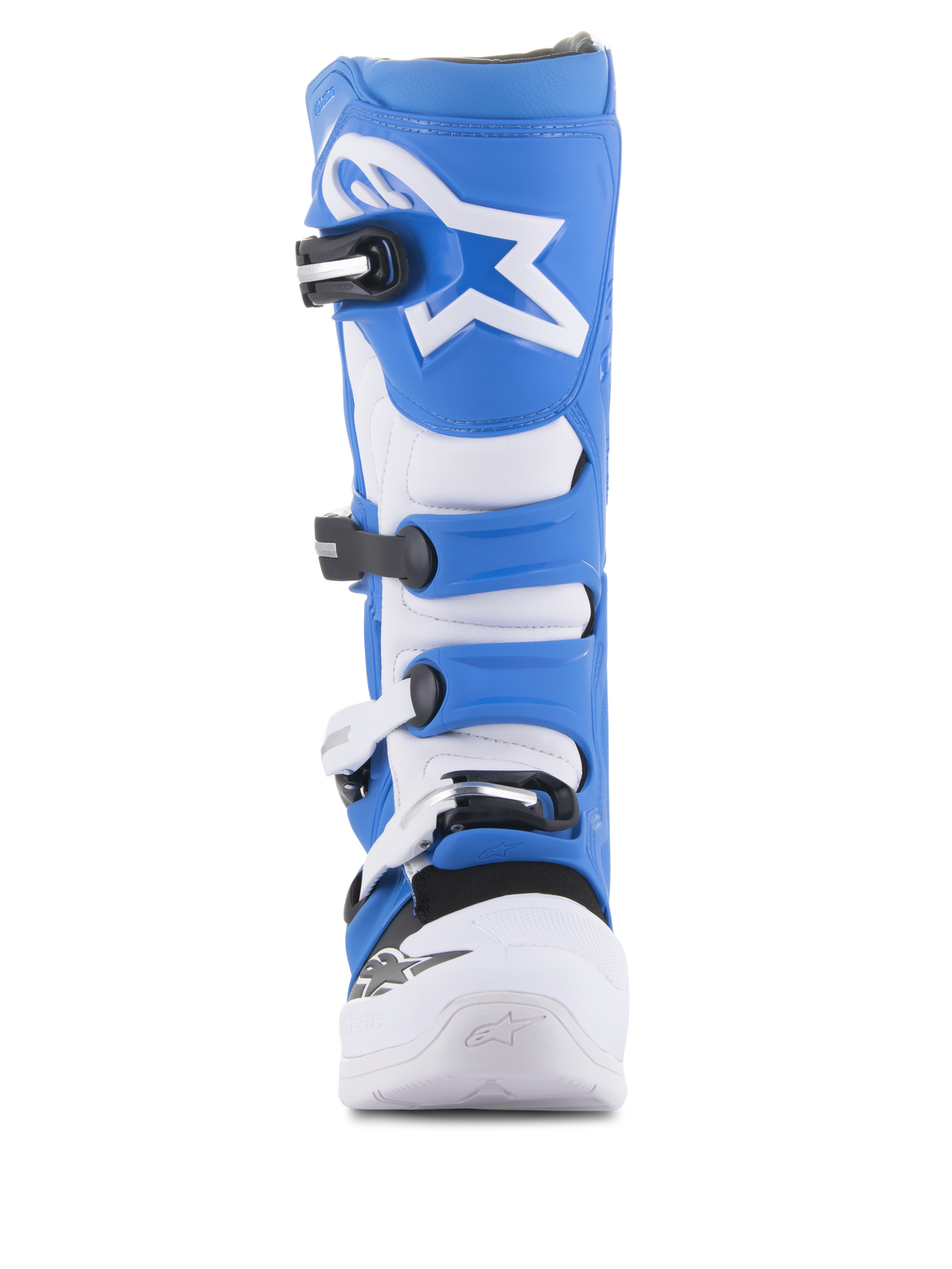 Bottes Alpinestars Tech 5, bottes de motocross, bleu et blanc, vue de face, avec un système de fermeture à quatre boucles, logo étoile Alpinestars blanc sur la plaque de tibia bleue, et châssis en microfibre durable avec pointe renforcée blanche.