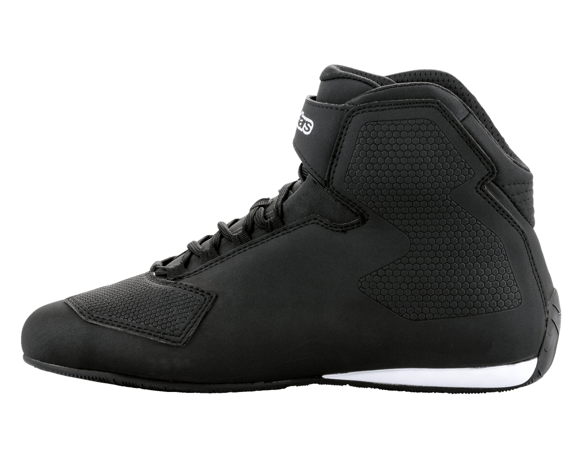 Alpinestars Sektor Shoes, Black and White motorcycle riding shoes, high-top profile, speed lacing system with ankle strap, textured microfiber chassis, white sole detailing at the heel, sleek protective footwear for road riding