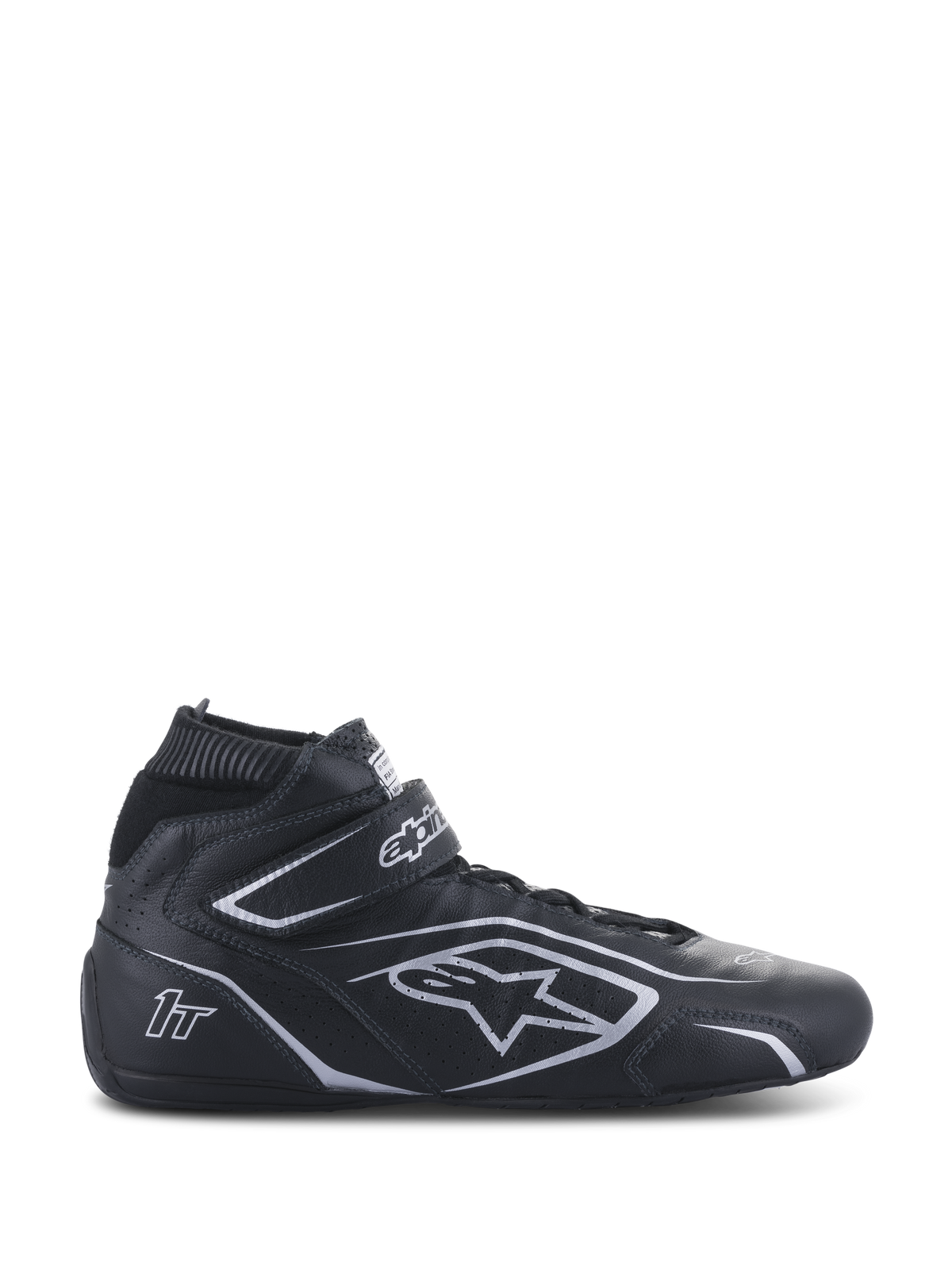 Alpinestars Tech-1 T V3 FIA, chaussures de course automobile, noires et argentées, bottines montantes en cuir avec sangle velcro à la cheville, panneaux latéraux perforés et logos argentés, certifiées FIA pour la compétition automobile professionnelle