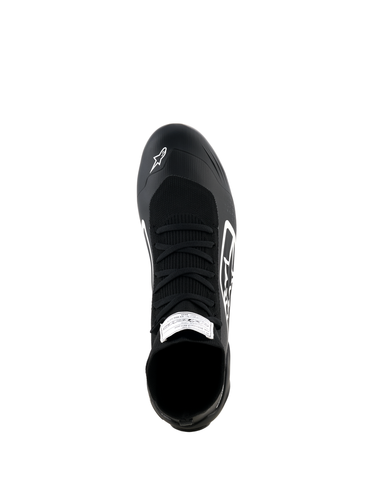 Chaussures Alpinestars Supertech K, chaussures de karting, noir et blanc, vue de dessus présentant une tige entièrement tricotée avec lacets noirs, logo Alpinestars blanc sur la pointe et étiquette de certification FIA sur la languette