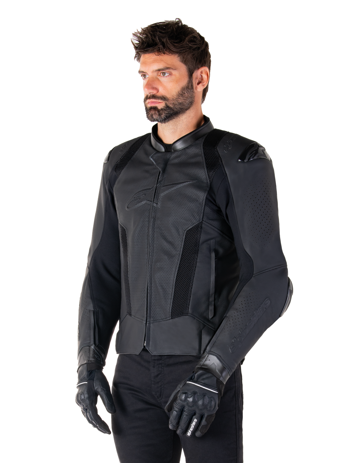Veste en cuir Alpinestars Missile V3 Airflow, Noir, portée par un homme avec des gants et un pantalon de moto noirs, dotée de larges panneaux en cuir perforé, de protections d'épaules DFS et d'une coupe racing épurée.