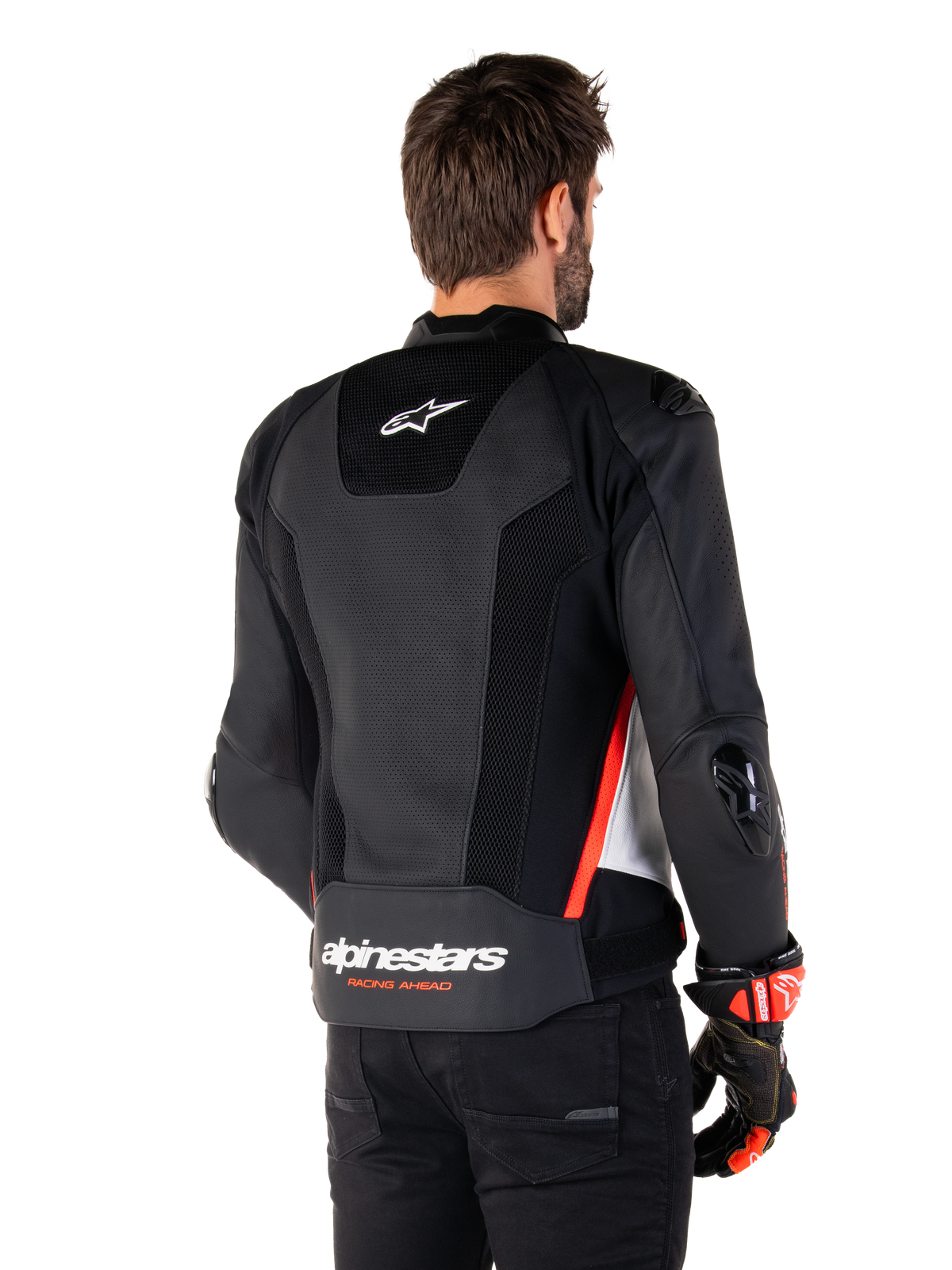 Veste en cuir Alpinestars Missile V3 Airflow, vue arrière, noir, blanc et rouge fluo, dotée de perforations étendues pour une ventilation optimale, de sliders DFS externes sur les épaules et les coudes, et du logo Alpinestars dans le bas du dos.