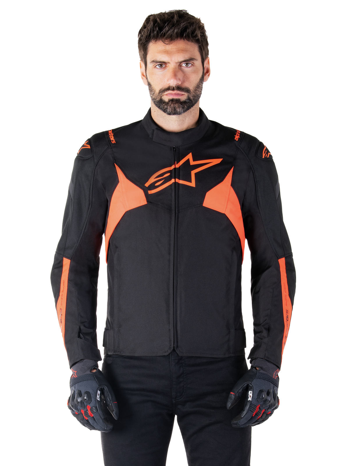 Alpinestars T-Jaws V4 Waterproof Jacket, Motorcycle Sport Jacket, Black and Red Fluo, featuring neon accents and a prominent star logo on the chest, worn by a male model with black riding gloves, sleek racing-inspired textile design