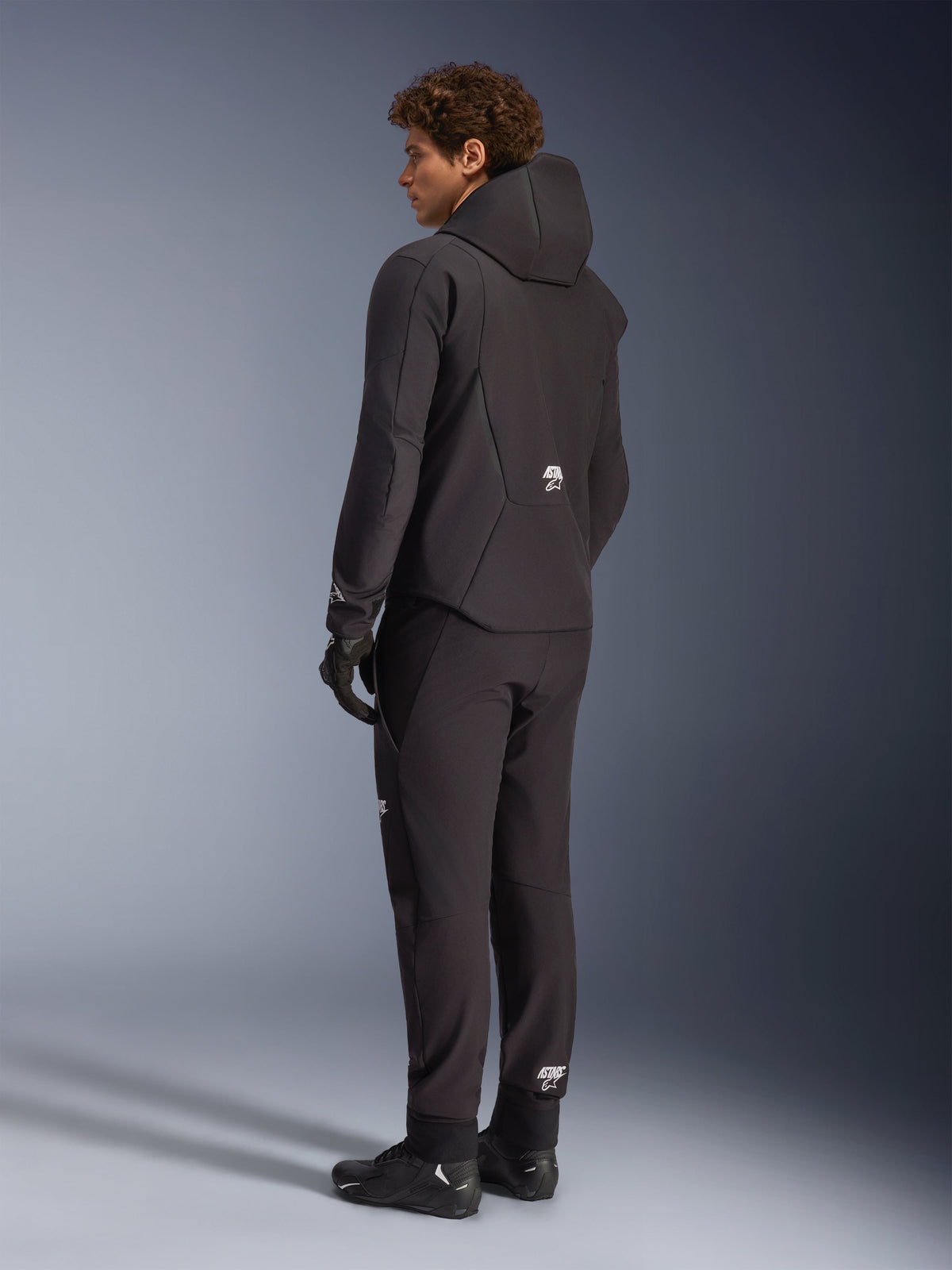 Alpinestars Aeroshell Waterproof Jacket, Road Riding Hoodie, Men's, Black, Textile Softshell, back view on model.