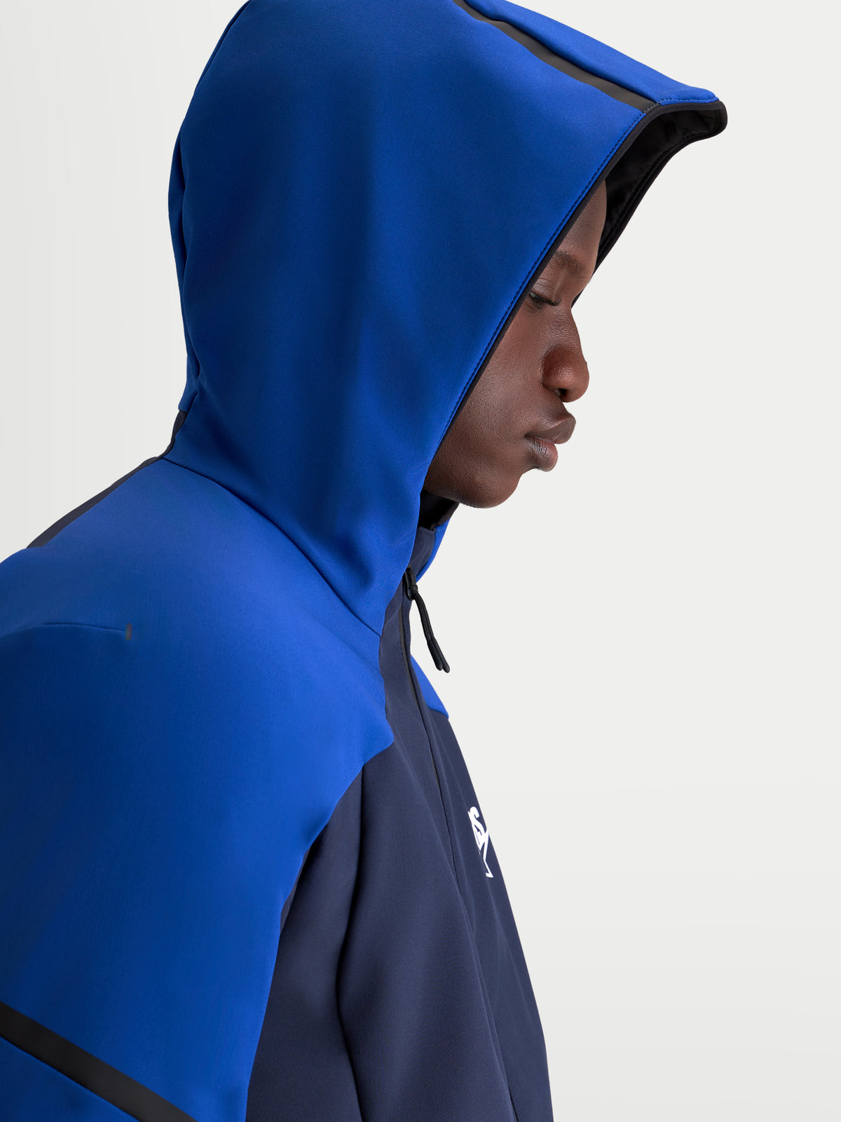 Alpinestars Aeroshell Wp veste, veste de moto imperméable pour homme bleue et bleu marine avec capuche, vue rapprochée de profil