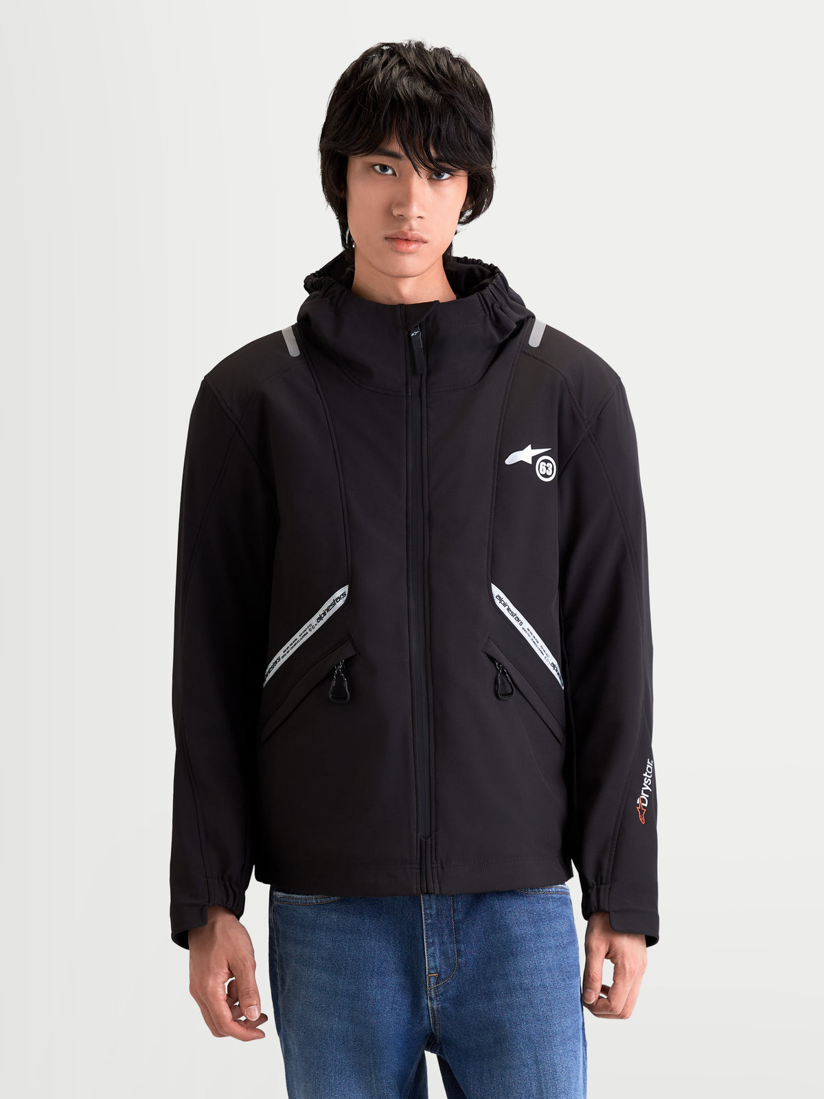 Alpinestars C-5 Drystar® Jacket, men's urban contemporary motorcycle textile jacket in black, front view on a model wearing waterproof softshell riding apparel with integrated hood and reflective details