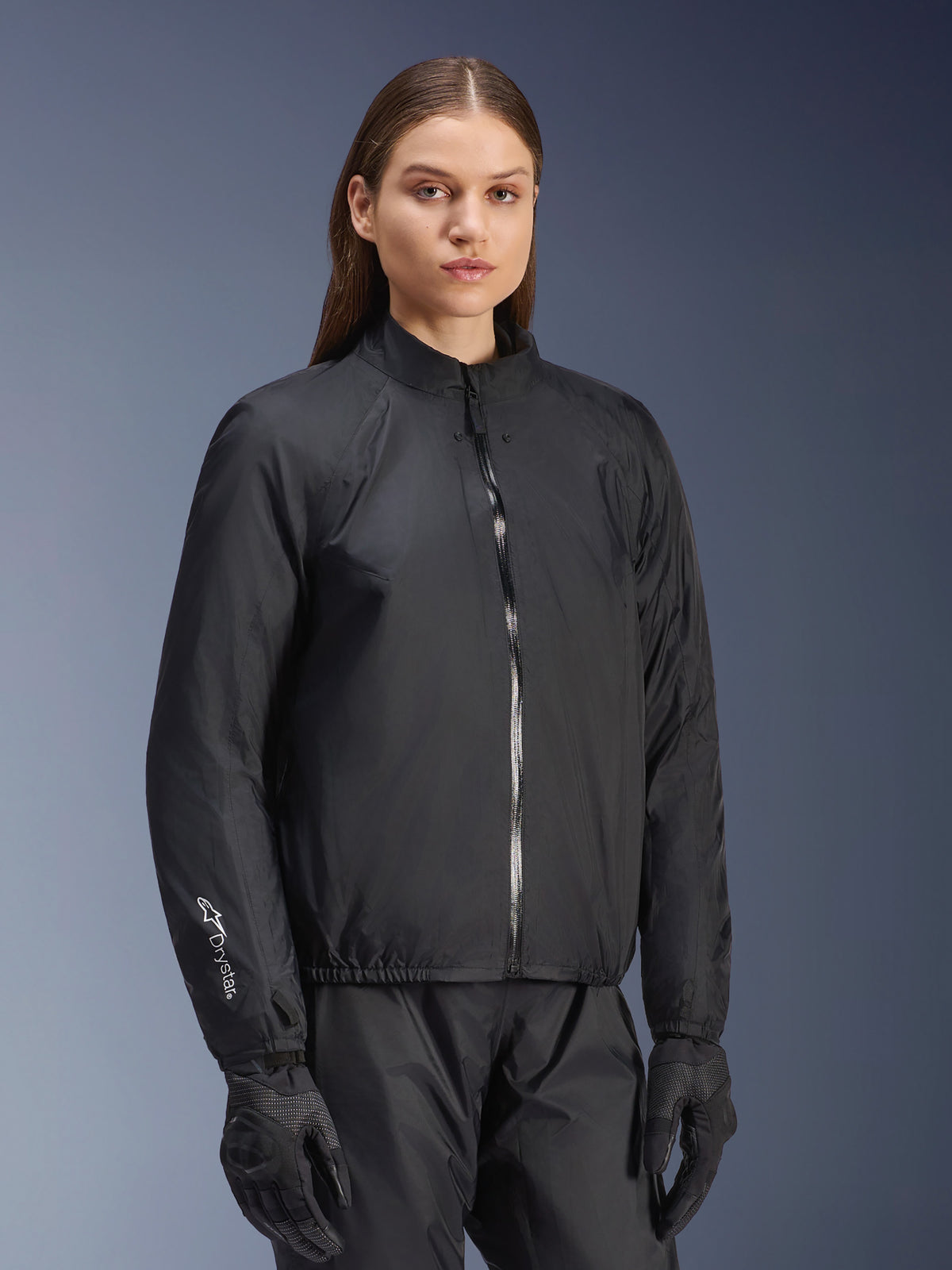 Alpinestars Stella Andes Air Drystar® Jacket, Women's Motorcycle Jacket, Black, featuring the detachable waterproof membrane layer with a full front zipper and Drystar logo on the sleeve, worn with matching black riding pants and gloves