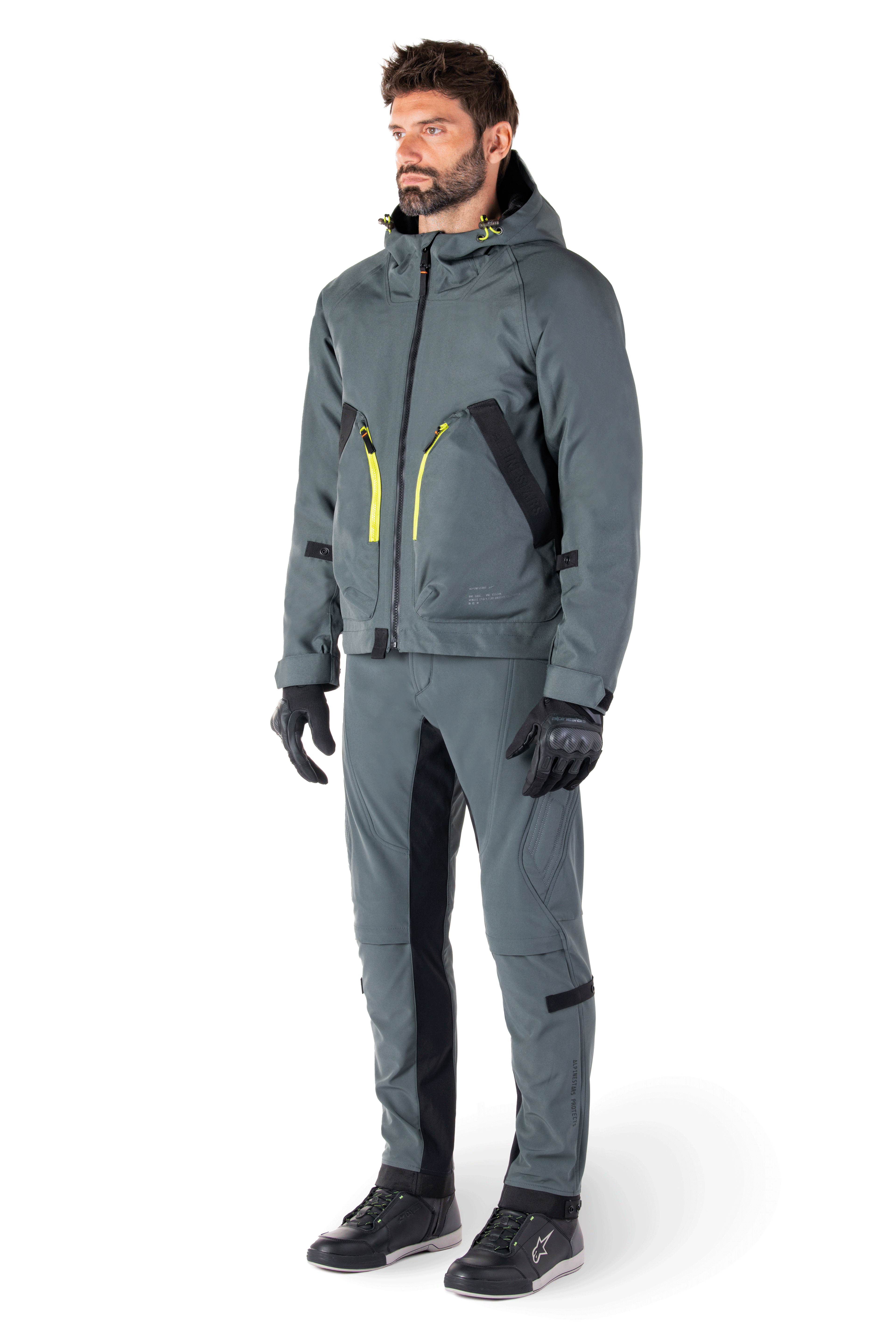 Alpinestars Morush Waterproof Parka en Urban Gray, veste de moto d'inspiration streetwear dotée d'une capuche anti-tempête, de grandes poches avant 3D et d'un design urbain minimaliste