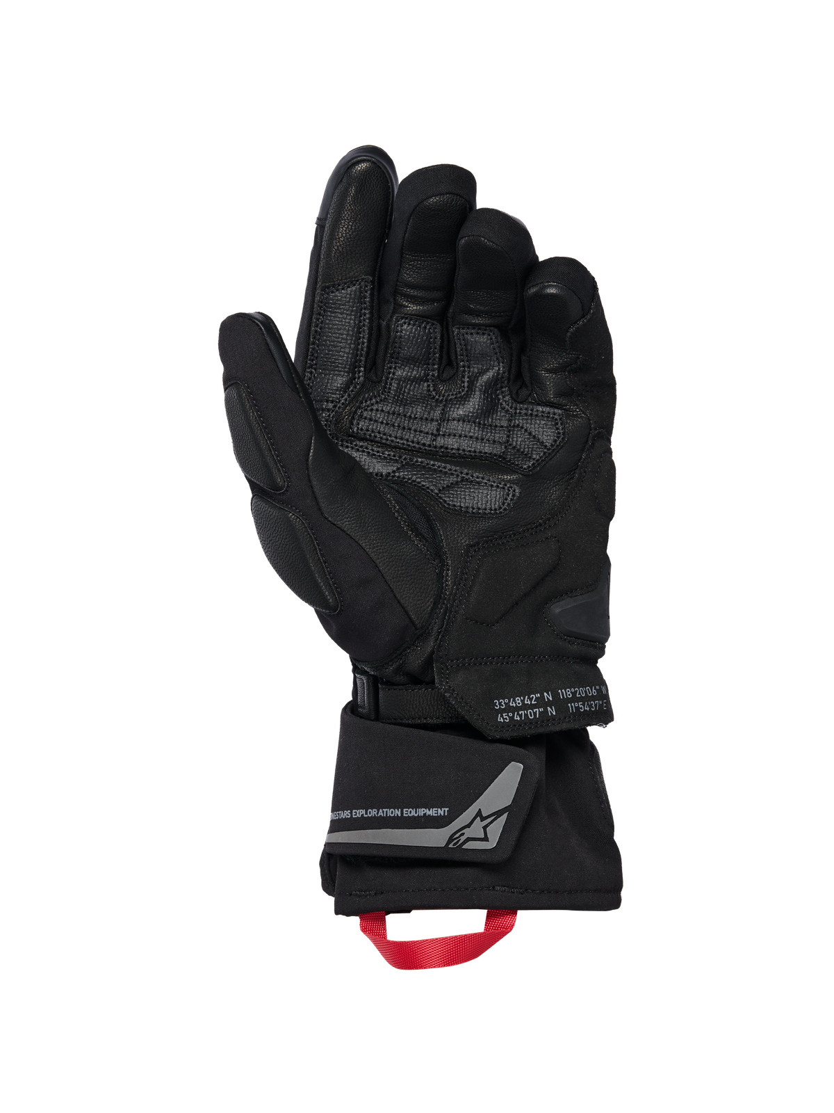 Gants isolés Alpinestars WT-8 GORE-TEX, gants de moto, noirs, vue de la paume intérieure montrant des empiècements en cuir renforcé et des protections rembourrées, manchette longue avec boucle de tirage rouge et marquage Alpinestars Exploration Equipment avec coordonnées géographiques, design technique pour la route et l'aventure