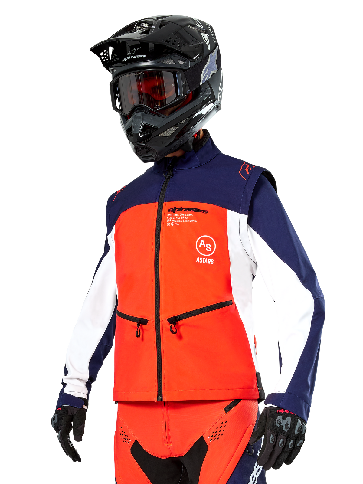Alpinestars Lite-Dura Softshell Jacket in Navy, Hot Orange, and White, Motocross Gear, worn with black helmet and goggles, protective gloves, and matching racing pants