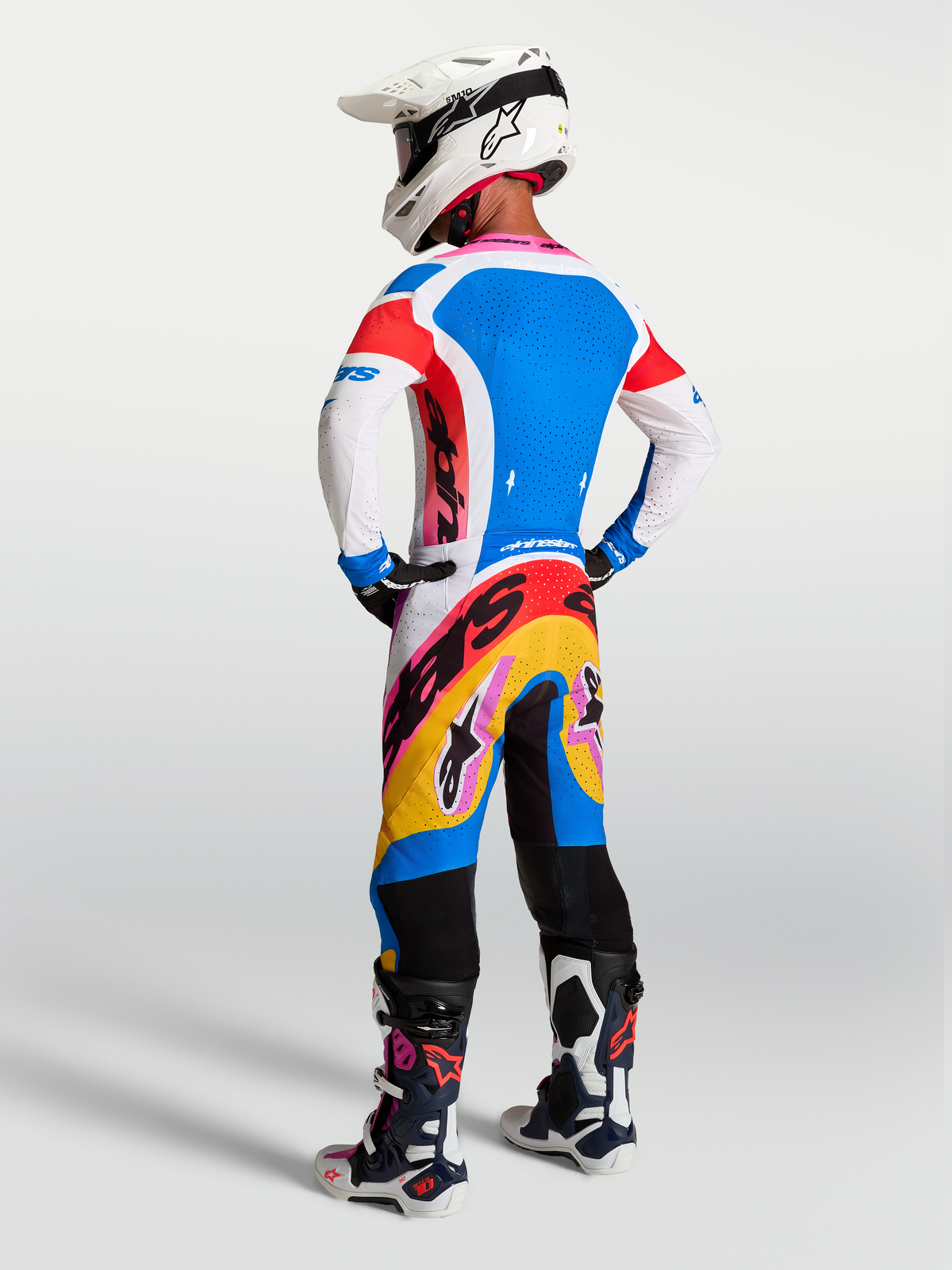 Alpinestars Supertech Dyna, pantalons de motocross homme, bleus et blancs, vue de dos, coupe athlétique et tissu extensible
