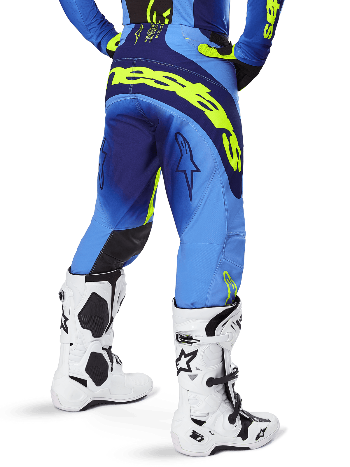 Alpinestars 2025 Techstar Melt Pants, Motocross Pants, Blue and Yellow Fluo, back view showing large yellow branding on the seat and thighs, worn with white motocross boots and matching blue jersey, athletic race fit for off-road riding