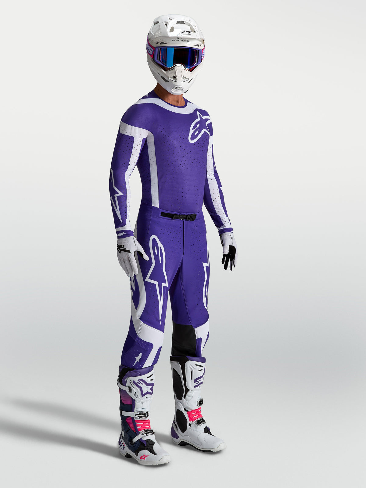Alpinestars Supertech Vesta Pants in Deep Blue and White, professional motocross gear on-model with matching racing set.