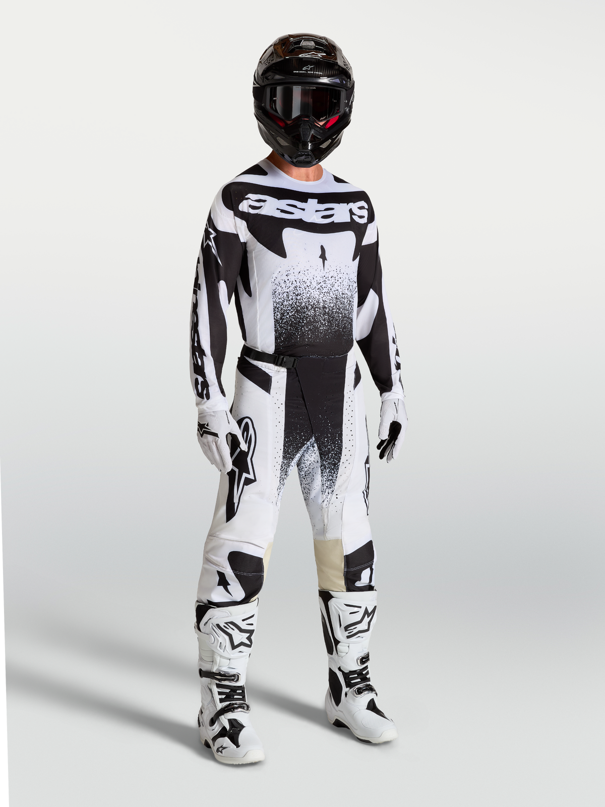 Alpinestars Techstar Swan, pantalon de motocross pour homme, noir et blanc, coupe athlétique en tissu ripstop extensible.