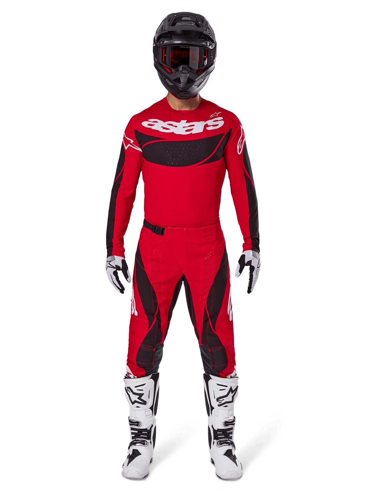 Pantalon Alpinestars Techstar Dreem 2025, pantalon de motocross, rouge vif et noir, porté dans le cadre d'une tenue de course complète avec un maillot rouge assorti, un casque noir et des bottes blanches, design sportif avec un marquage audacieux pour la performance tout-terrain.