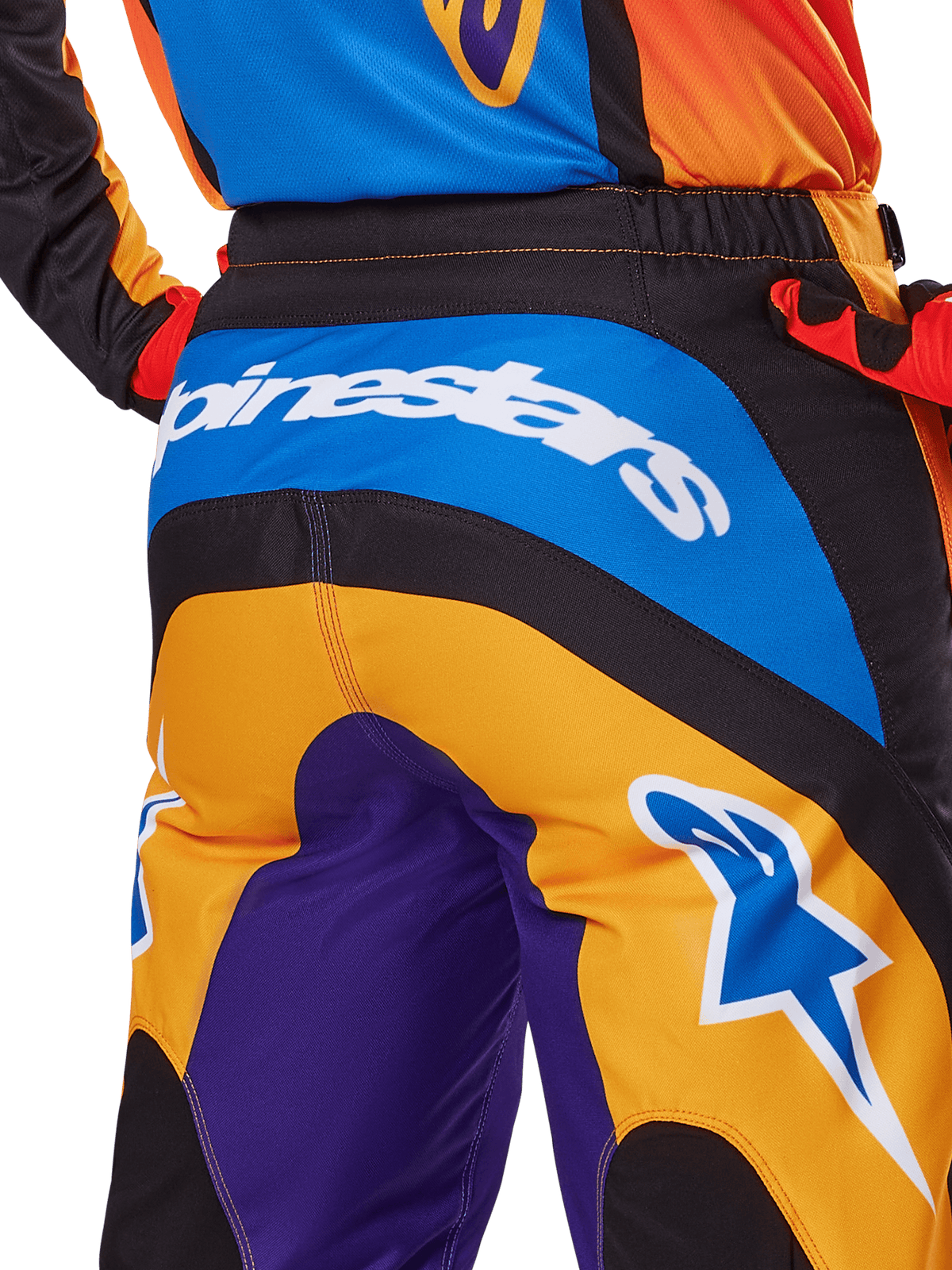 Alpinestars 2025 Fluid Wurx Pants, Motocross Pants, back view in Orange Blue and Purple, featuring a white Alpinestars logo across the seat and a blue Astar logo on the leg, technical construction for off-road riding