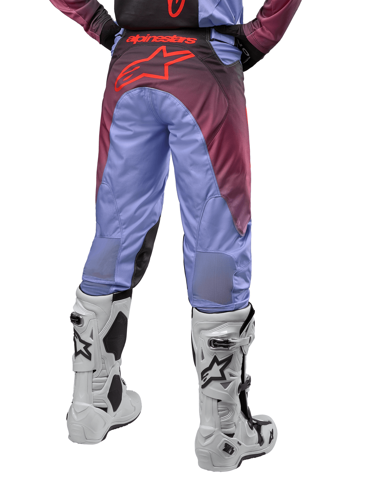 Alpinestars 2024 Racer Hoen Pants, Motocross Pants, Lavan Purple and Black, back view showing a large red star logo on the seat, worn with white motocross boots, featuring breathable stretch panels on the lower legs.
