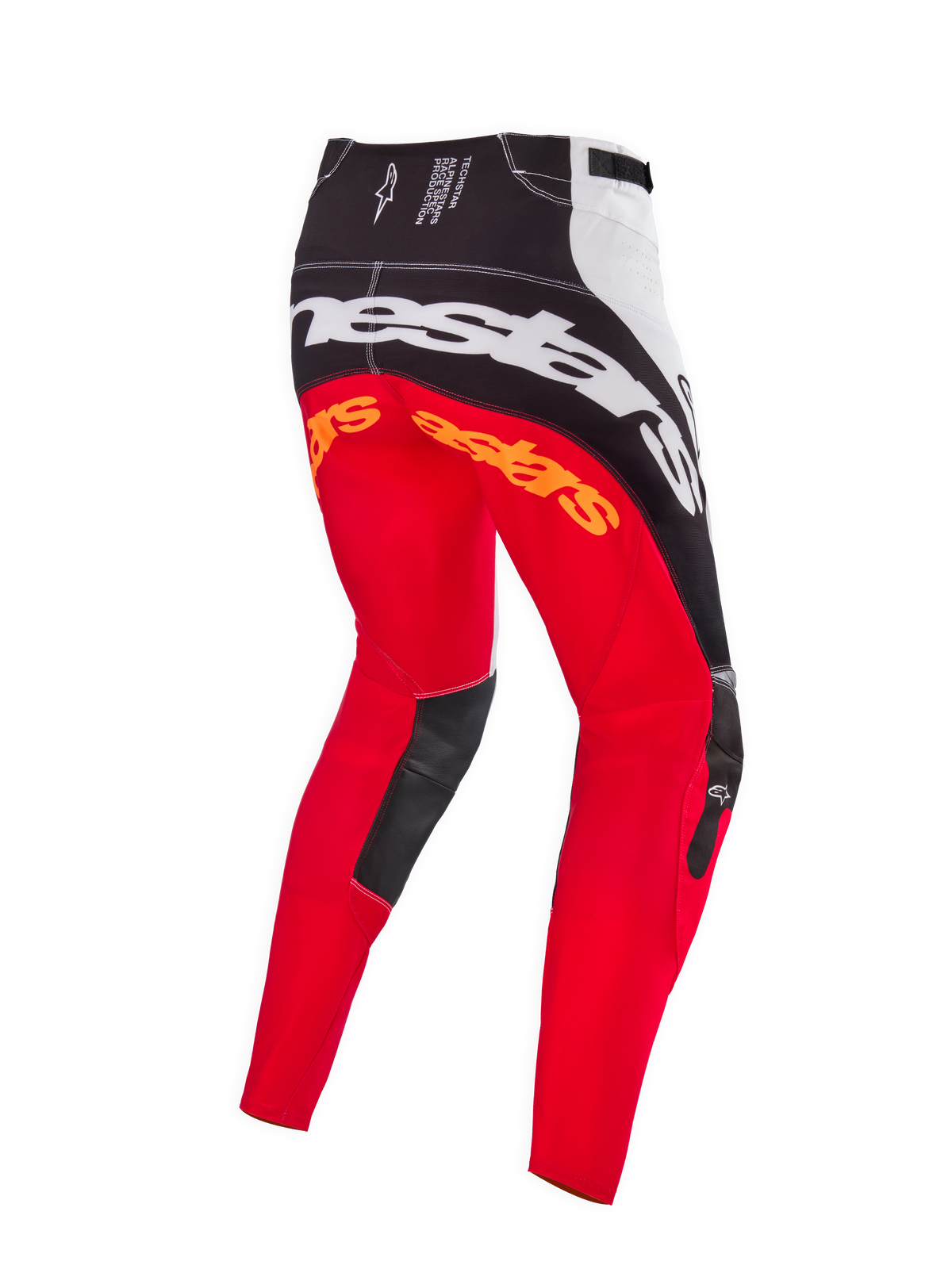 Alpinestars Techstar Deep Édition Limitée, pantalon de motocross, coloris noir, blanc et rouge fluo, vue arrière montrant le large marquage Alpinestars blanc sur l'assise, des logos orange sur le haut des jambes et des empiècements en cuir noir à l'intérieur des genoux, conçu pour la compétition tout-terrain professionnelle.