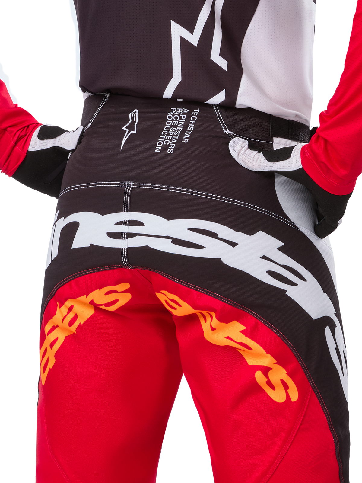 Alpinestars Techstar Deep Édition Limitée, pantalon de motocross, noir, blanc et rouge vif, avec une conception multi-panneaux, des genoux renforcés et des empiècements extensibles quadridirectionnels pour des performances tout-terrain