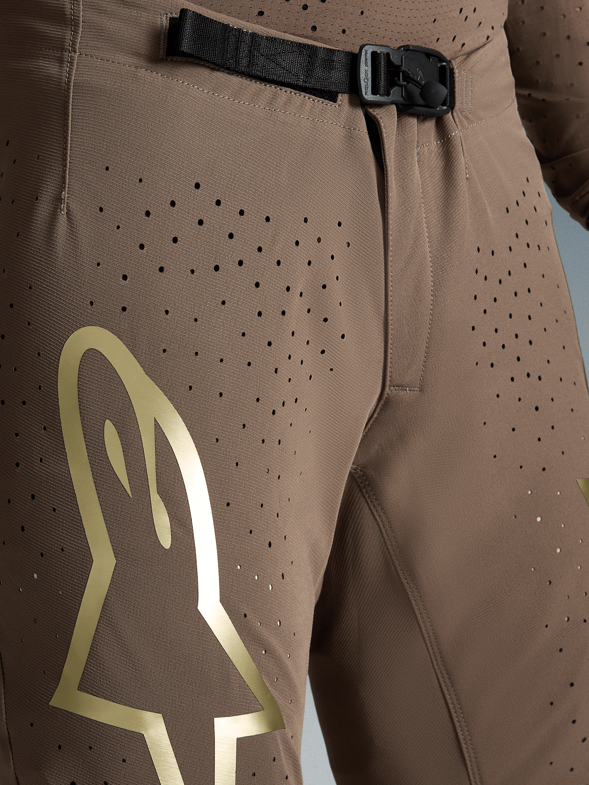 Pantalon motocross Alpinestars Supertech Air Gold, marron et doré, tissu extensible ventilé et boucle magnétique SX1.