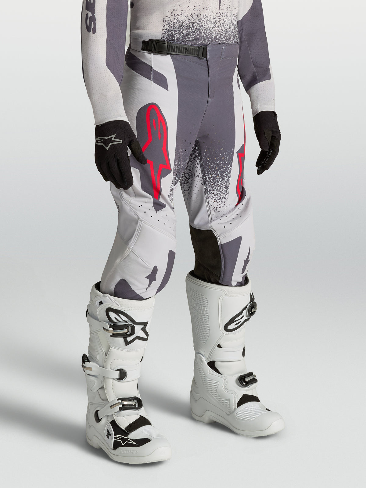 Alpinestars Youth Supertech Swan Pants, gray and light lilac athletic fit motocross racing pants with red fluo accents.