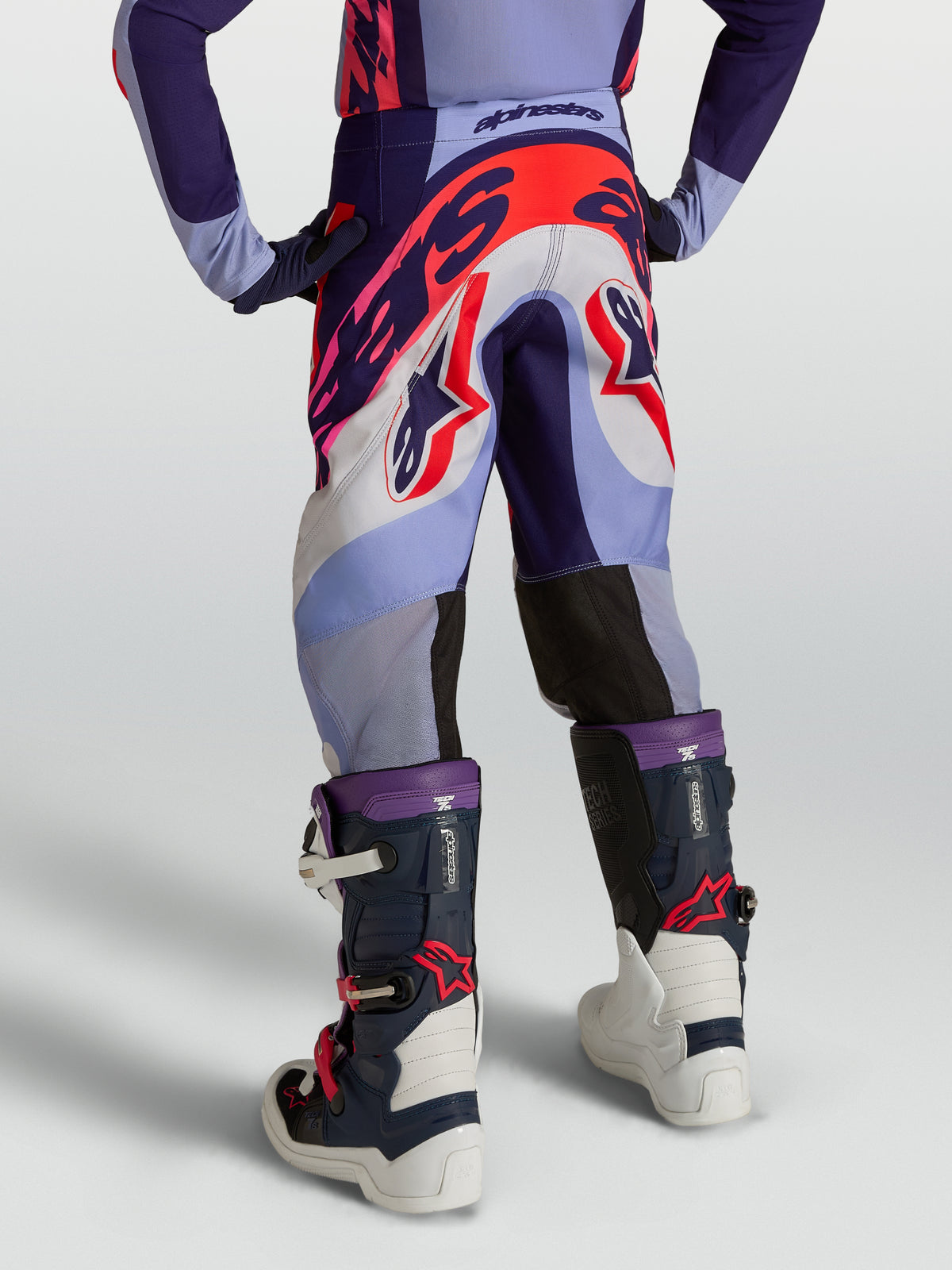 Pantalon Alpinestars Supertech Dyna Junior, équipement de motocross violet et rose fluo, tissu rip-stop extensible, coupe athlétique pour le tout-terrain
