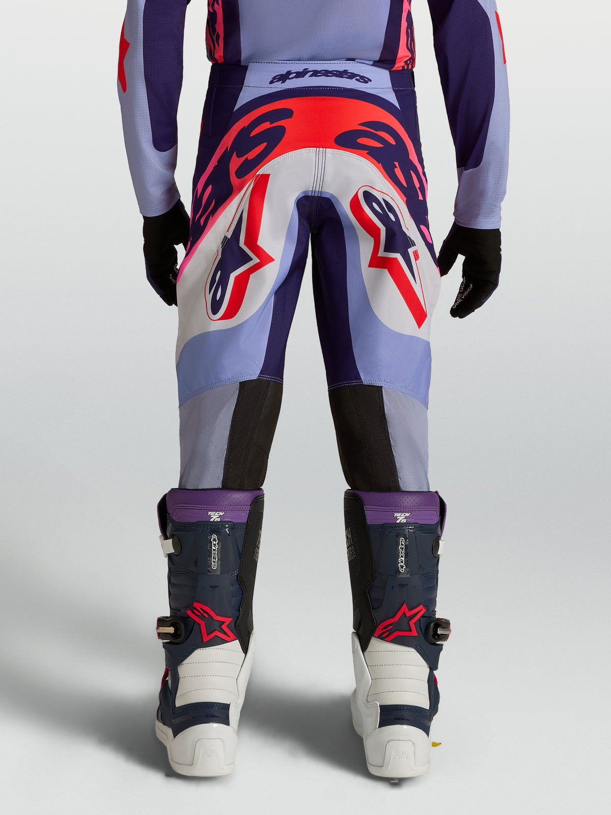 Pantalon Alpinestars Supertech Dyna Junior, pantalon de motocross violet et rose fluo, coupe athlétique, vue de dos