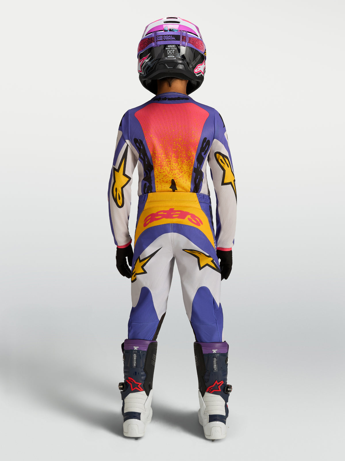 Pantalon Alpinestars Fluid Drag Junior, pantalon de motocross bleu et blanc avec détails jaunes, vue de dos