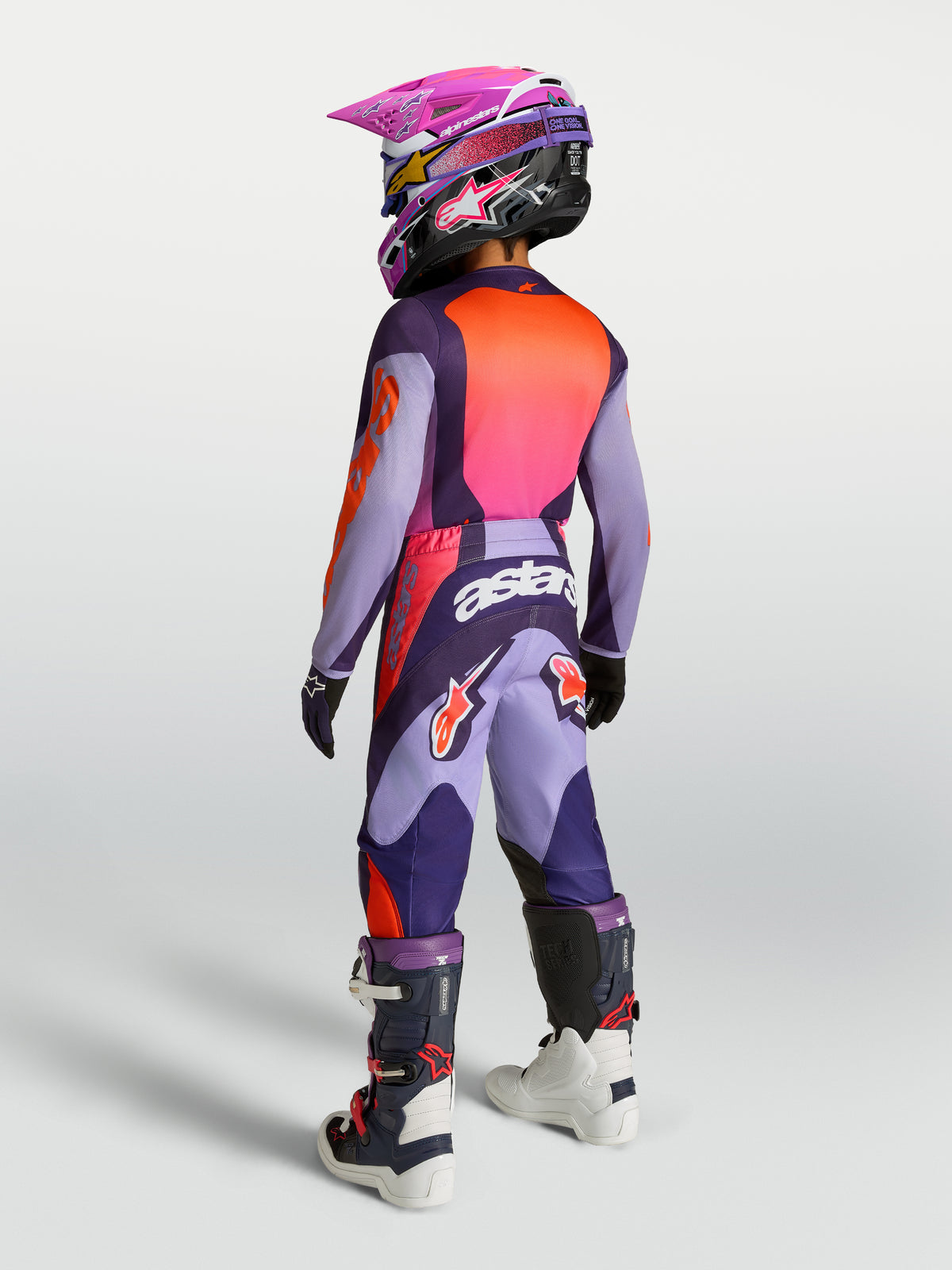 Pantalon Alpinestars Fluid Hunt Junior, motocross violet et rose fluo, polyfabric 600D durable, vue de dos sur mannequin.
