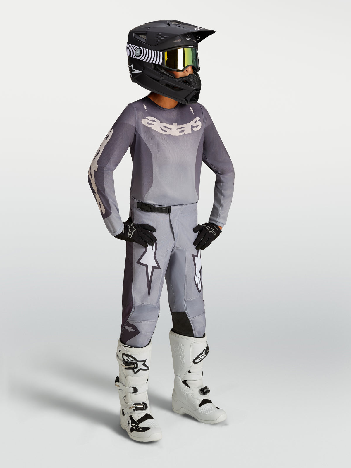 Alpinestars Youth Fluid Amber Pants in Sand, youth motocross pants featuring white star graphics and a pre-curved sport fit.