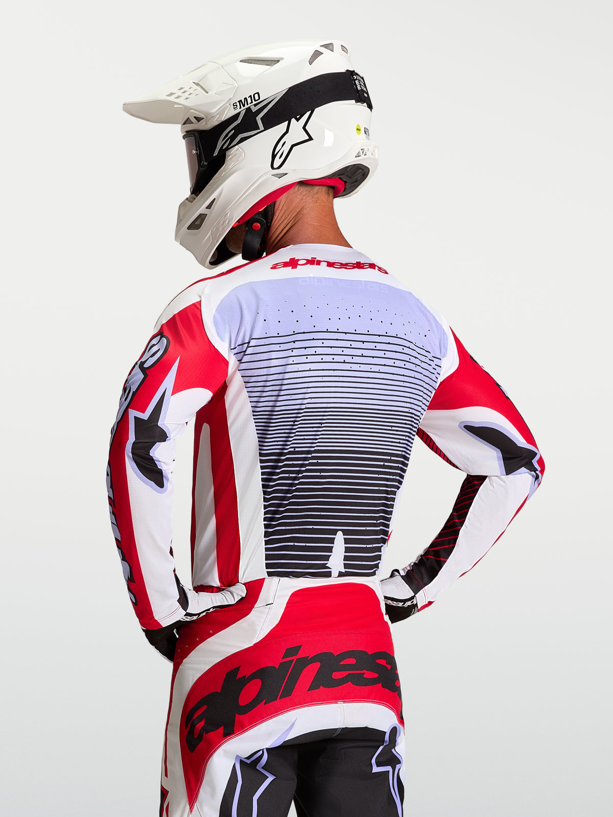 Alpinestars Maillot Techstar Maven, maillot de motocross pour homme, rouge feu et blanc, coupe athlétique, vue de dos
