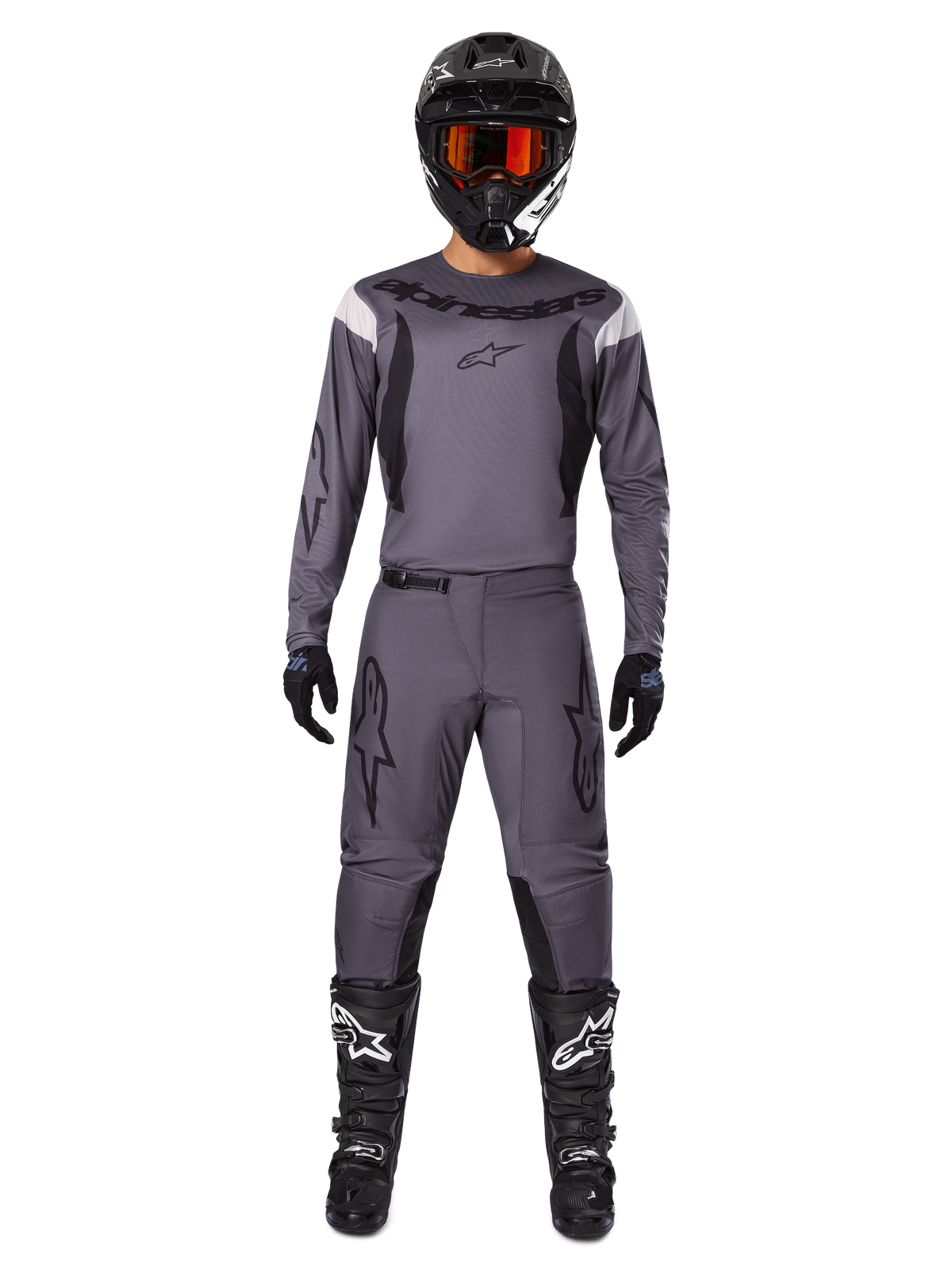 Ensemble d'équipement Alpinestars Fluid Haul 2025, équipement de motocross, gris, maillot et pantalon gris avec accents noirs, casque noir avec lunettes orange, bottes noires avec logos blancs, tenue de course coordonnée pour la performance tout-terrain