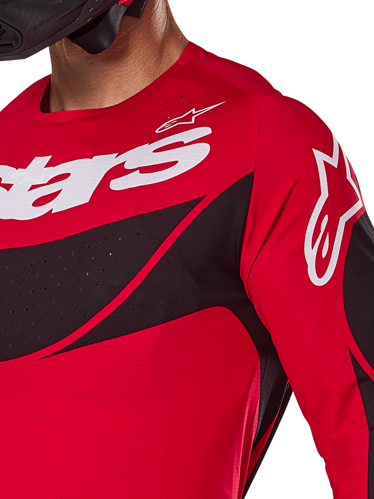 Alpinestars Maillot Techstar Dreem 2025, maillot de motocross, rouge vif et noir, vue rapprochée de la poitrine et de l'épaule avec logo blanc, empiècements diagonaux noirs avec perforations laser pour la ventilation, coupe de course athlétique.