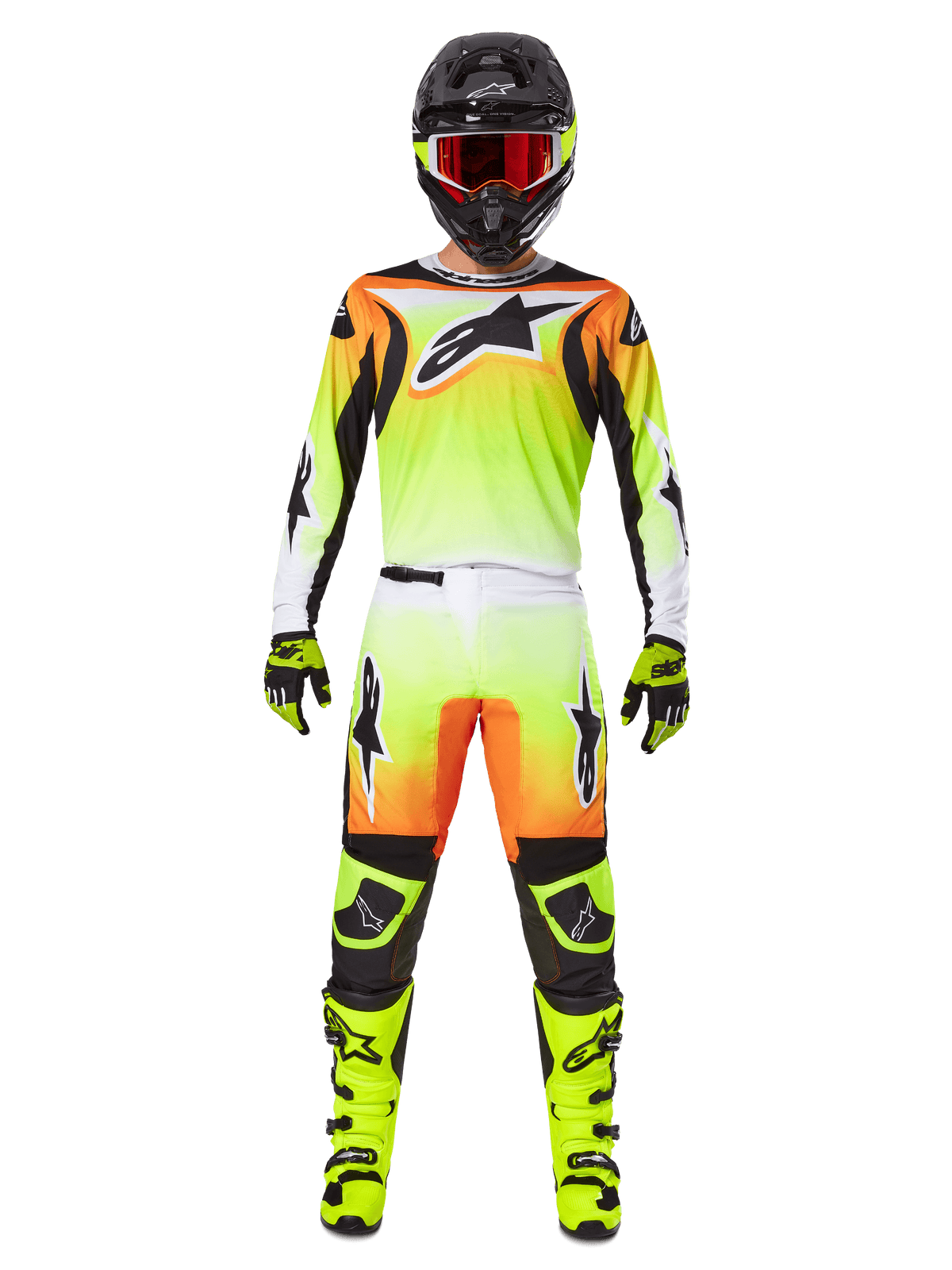 Motocross rider wearing complete racing gear, Alpinestars 2025 Fluid Wurx Gear Set, Yellow and Black with orange and white accents, jersey with large front logo, matching pants, black helmet with red-tinted goggles, neon yellow boots, coordinated outfit for off-road racing