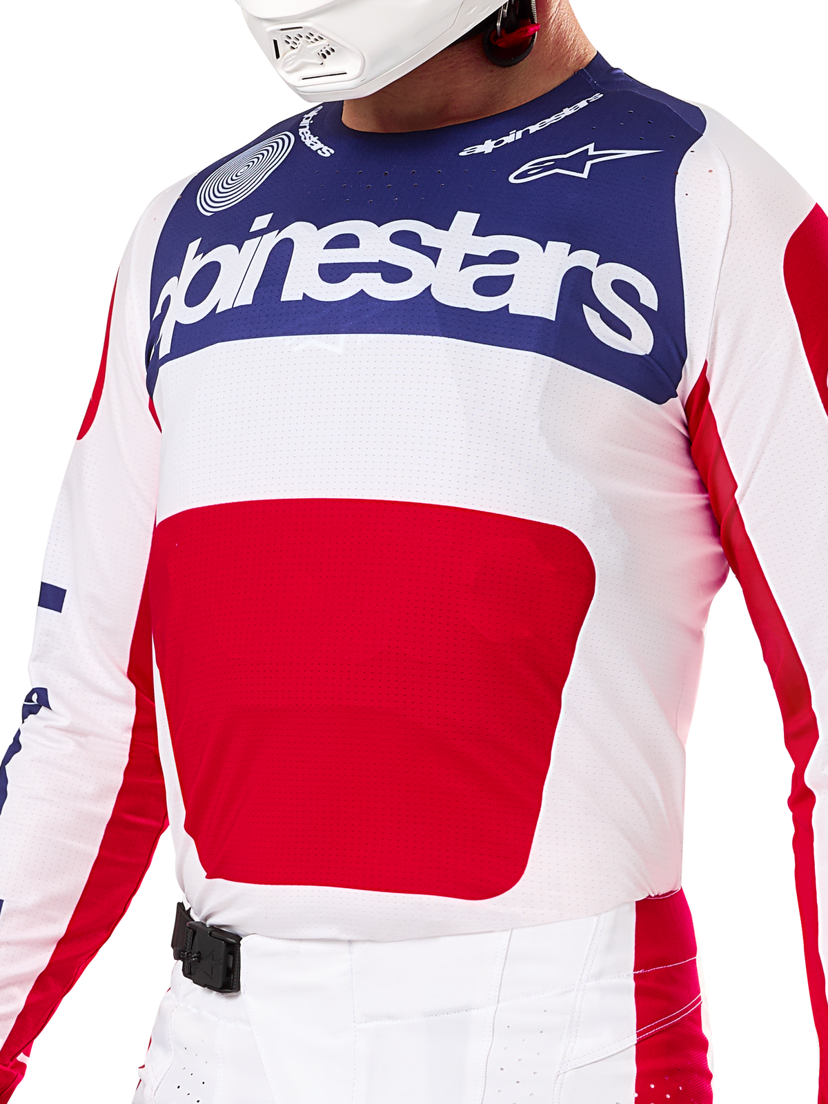 Alpinestars Limited Edition Techstar Fortitude Gear Set, Motocross Jersey and Pants in Red White and Blue, featuring a white jersey with a navy blue upper panel and a large red center graphic, matching white and red pants with an SX2 magnetic buckle, athletic fit with laser-cut perforations for off-road racing.