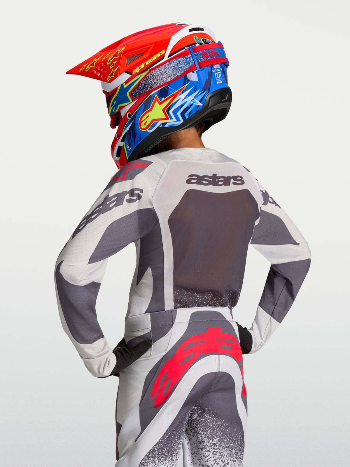 Alpinestars 2027 Youth Supertech Swan Jersey, Gray and Lilac breathable mesh motocross jersey, rear view on rider.